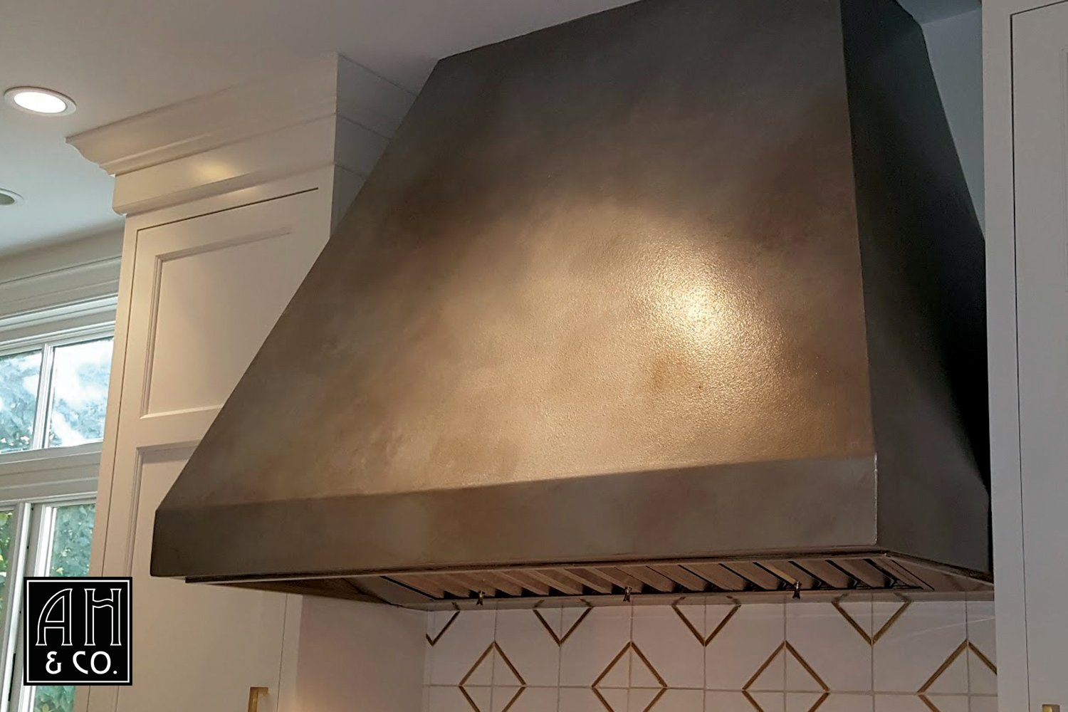 ariana-hoffman-metallic-laster-shimmerstone-oven-hood-kitchen-pewter-patina-vinatge-classic-french.jpg