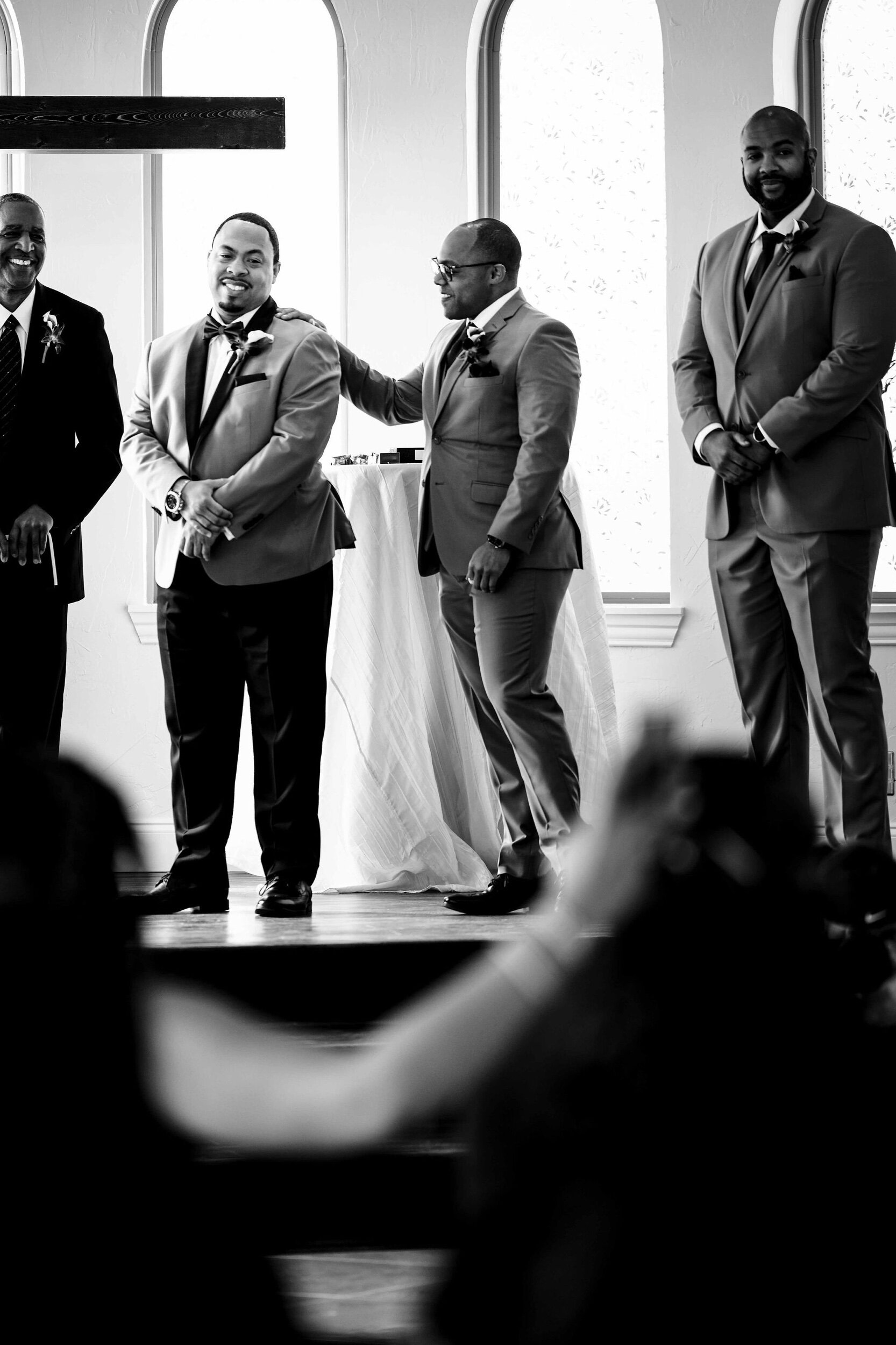 wedding-candid-groom-groomsmen.jpeg