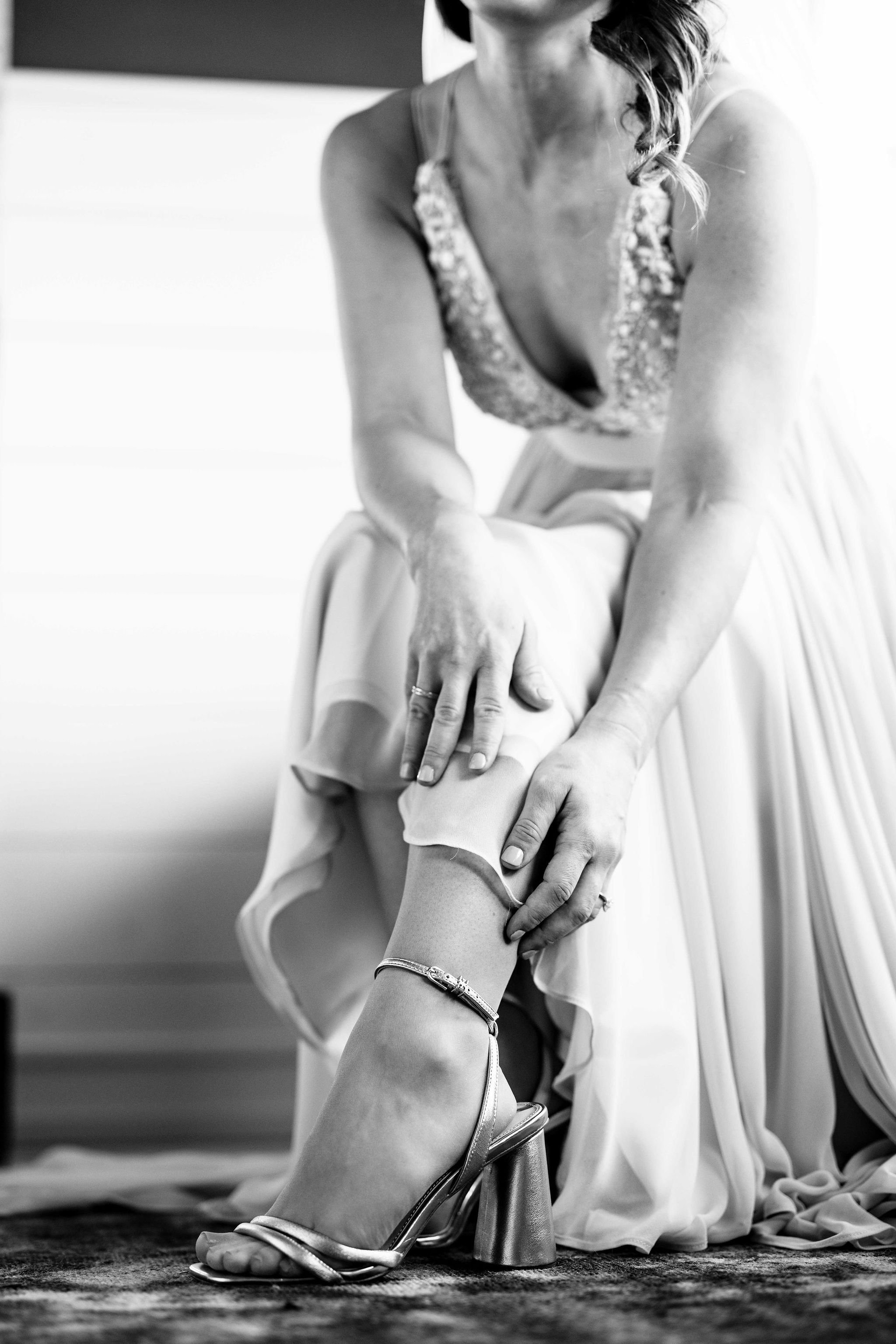 Bride - putting on shoes - getting ready.jpg