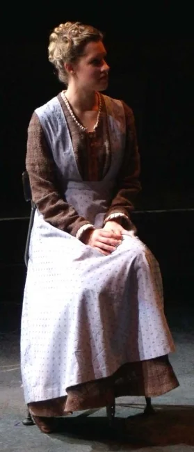  This dress and apron I draped, cut, and stitched through completion.&nbsp; I was also the assistant designer for this production. 