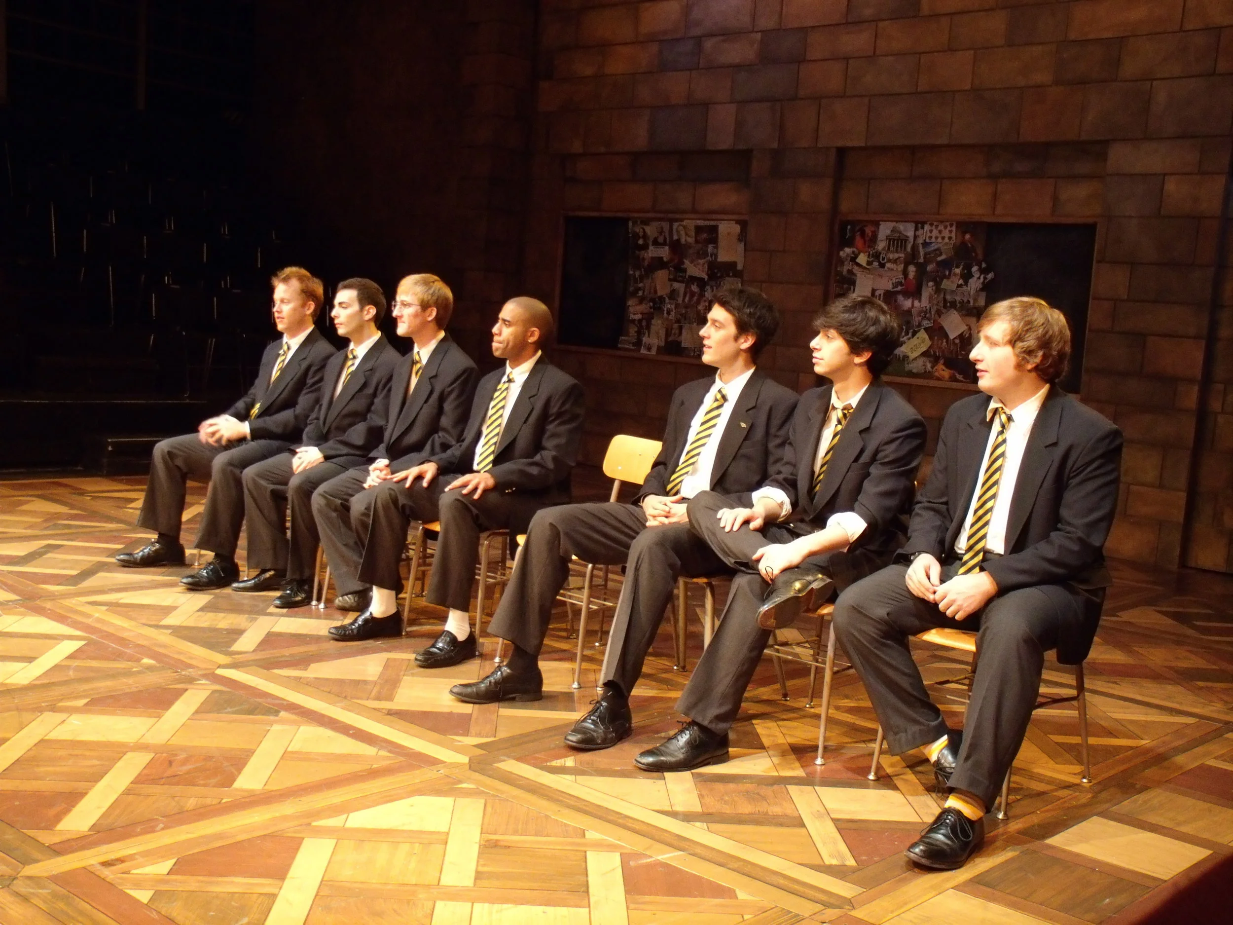 The “History Boys.”  The play  The History Boys  takes place at a secondary school for boys in Northern England in the 1980s. The boys are preparing to take their entrance exams to Oxford or Cambridge under the instruction of their teachers, Hector,