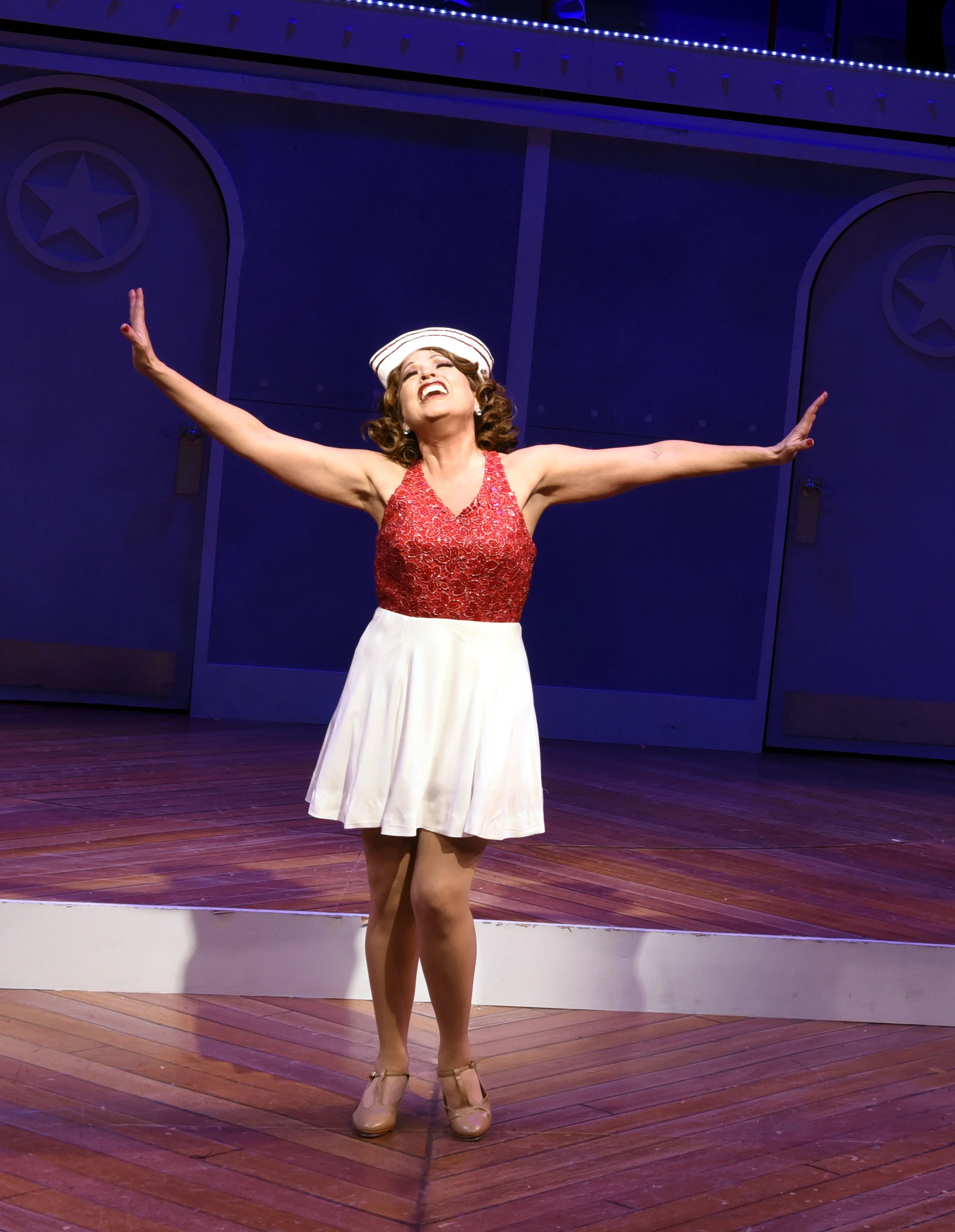  These production photos were taken the same day that I completely remade the dress.  Again the biggest changes to the final design were the addition of the belt, shortening the skirt, and adding the applique. Photograph by Porthouse Theatre. 