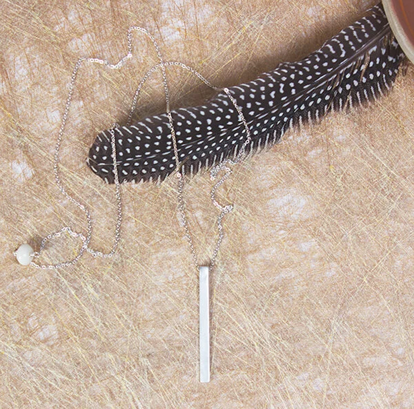LongDropNeckSilverWithFeather&DishSquare600.jpg