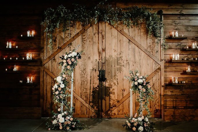 swipe to see this ceremony backdrop in action with added aisle decor - not to mention, it was repurposed in the reception too!