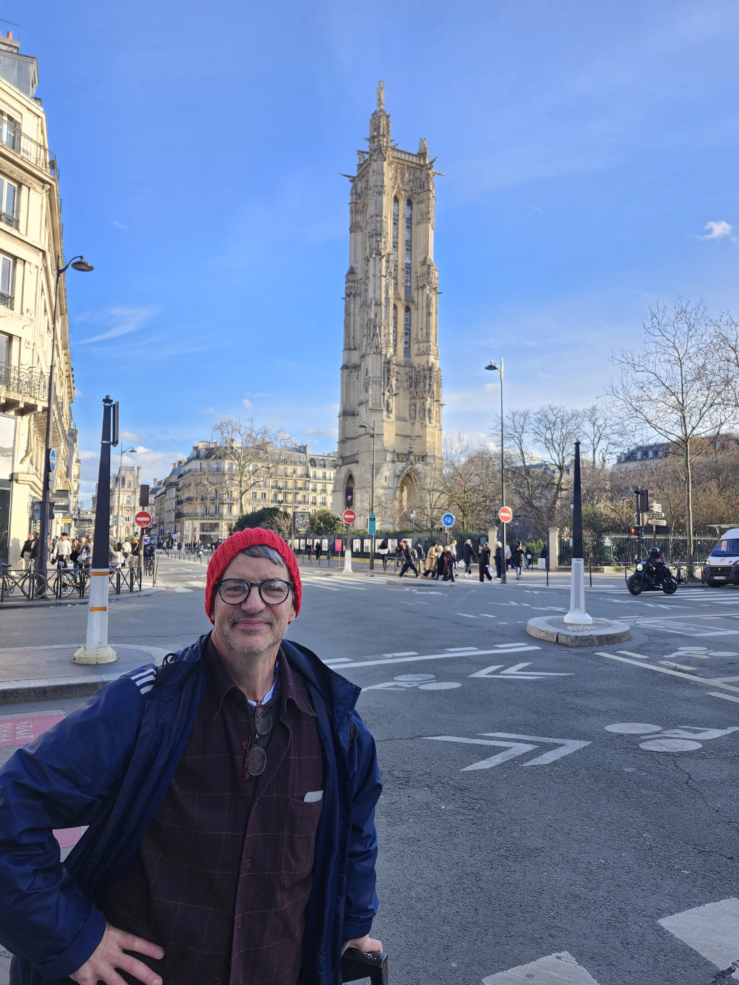 KD in red hat, St. Jacques Memorial, Paris.jpg