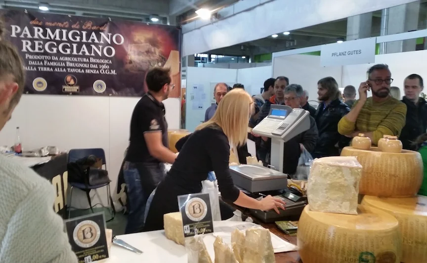 Buying Parmesan cheese from a cheese factory located in the Italian town, "Parma." Aha, it finally makes sense.