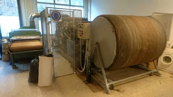 A 5 foot drum that wraps the fiber across the top to create smooth, even sheets
