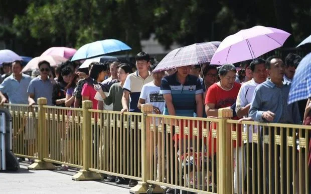 People waiting in line for the viewing
