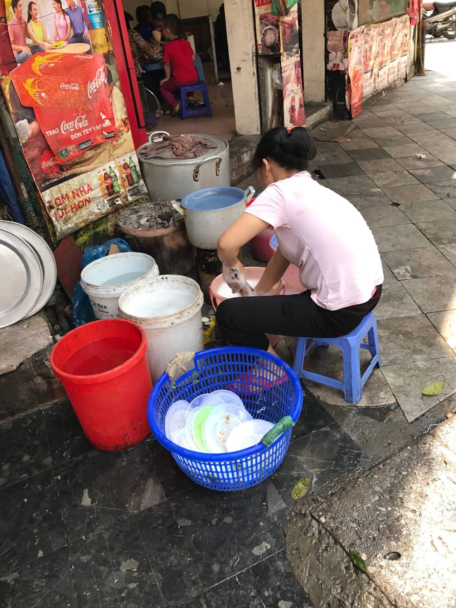 Every district where there are restaurants they wash the plates out on the sidewalk
