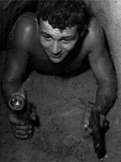 American soldier searching tunnel
