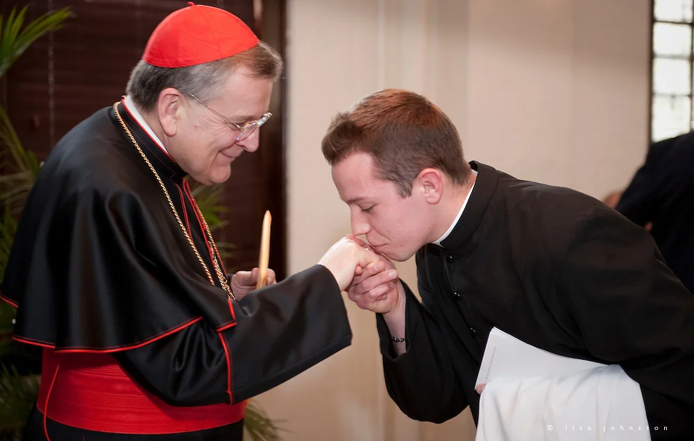 joseph-kisses-ring.jpg