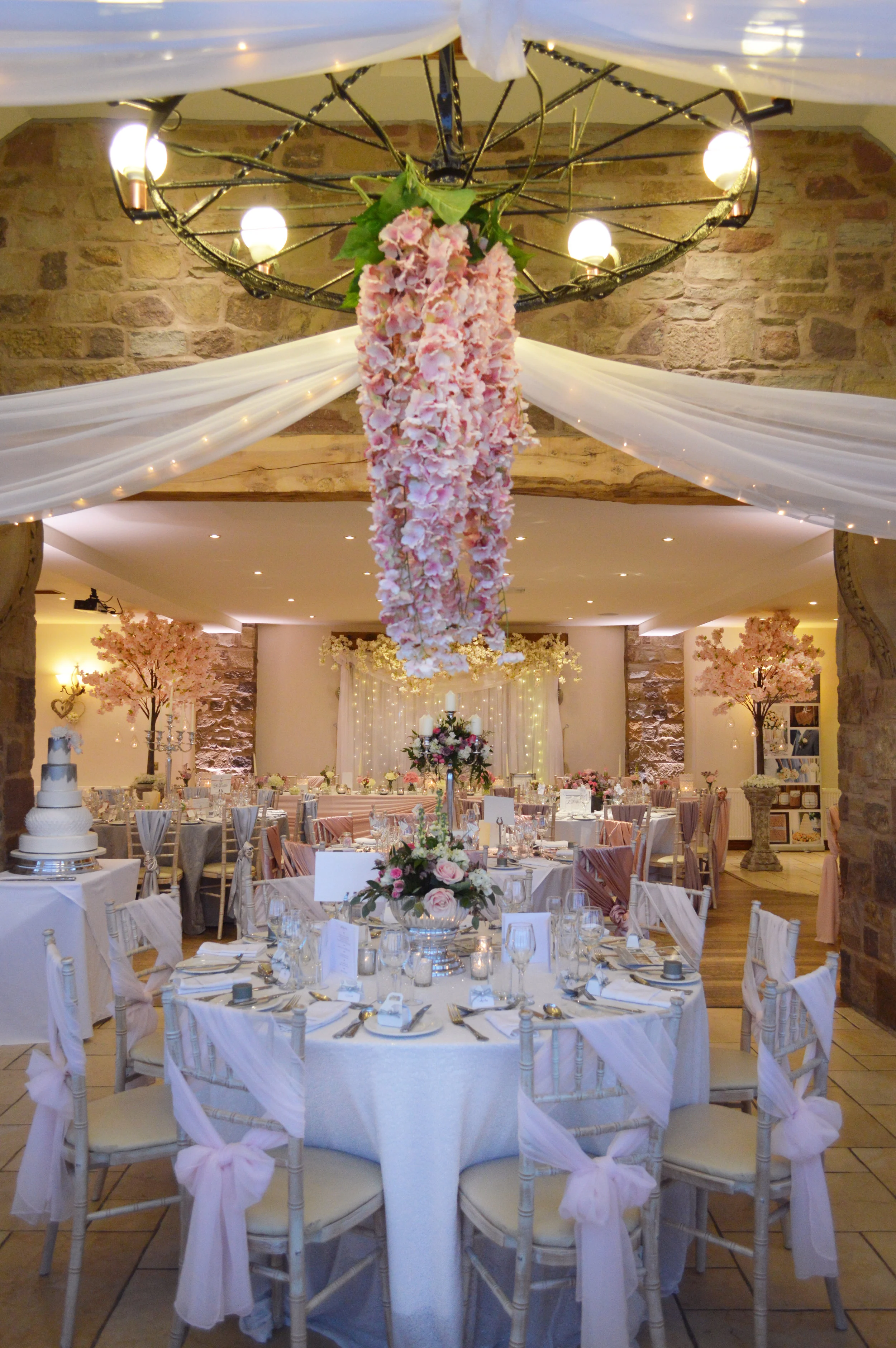 Flowers hanging from chandelier