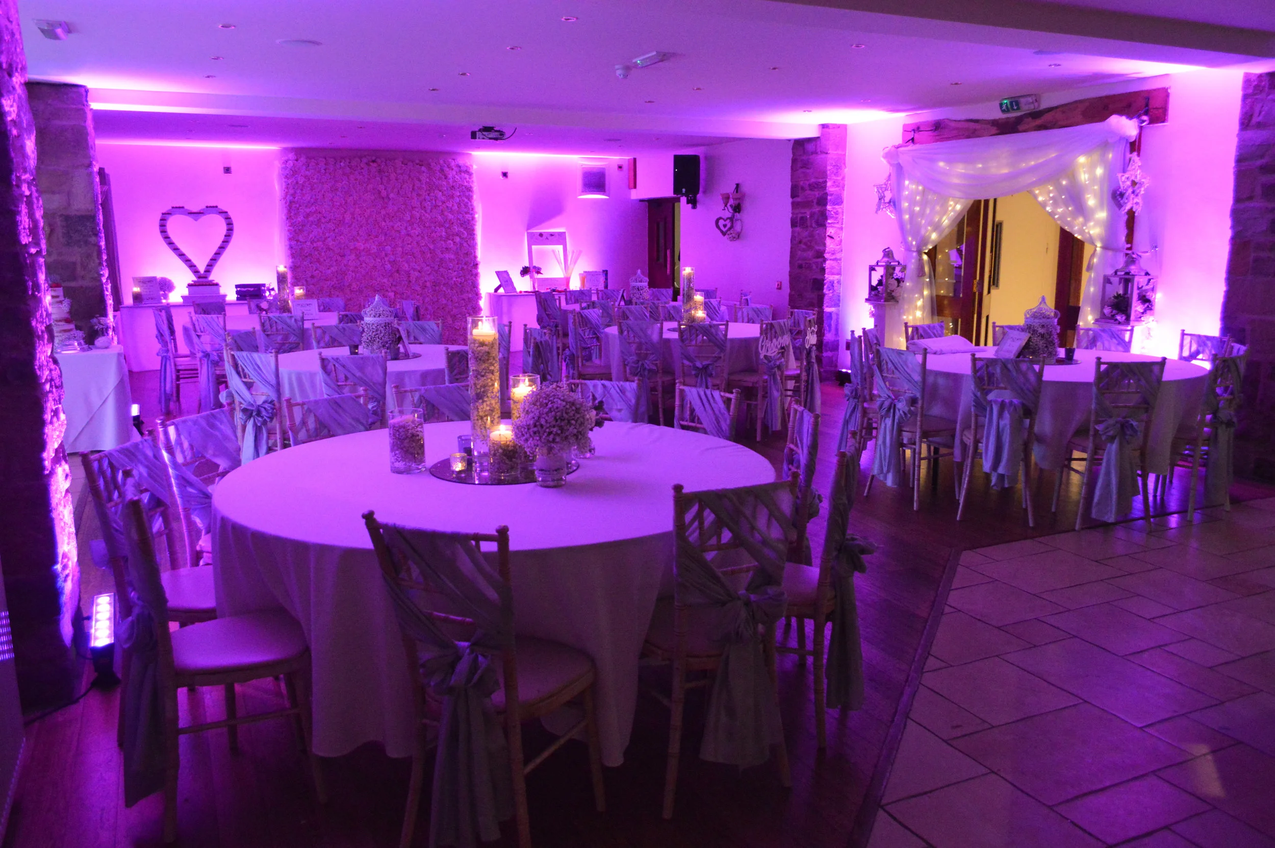 Flower wall on the back wall for the evening reception