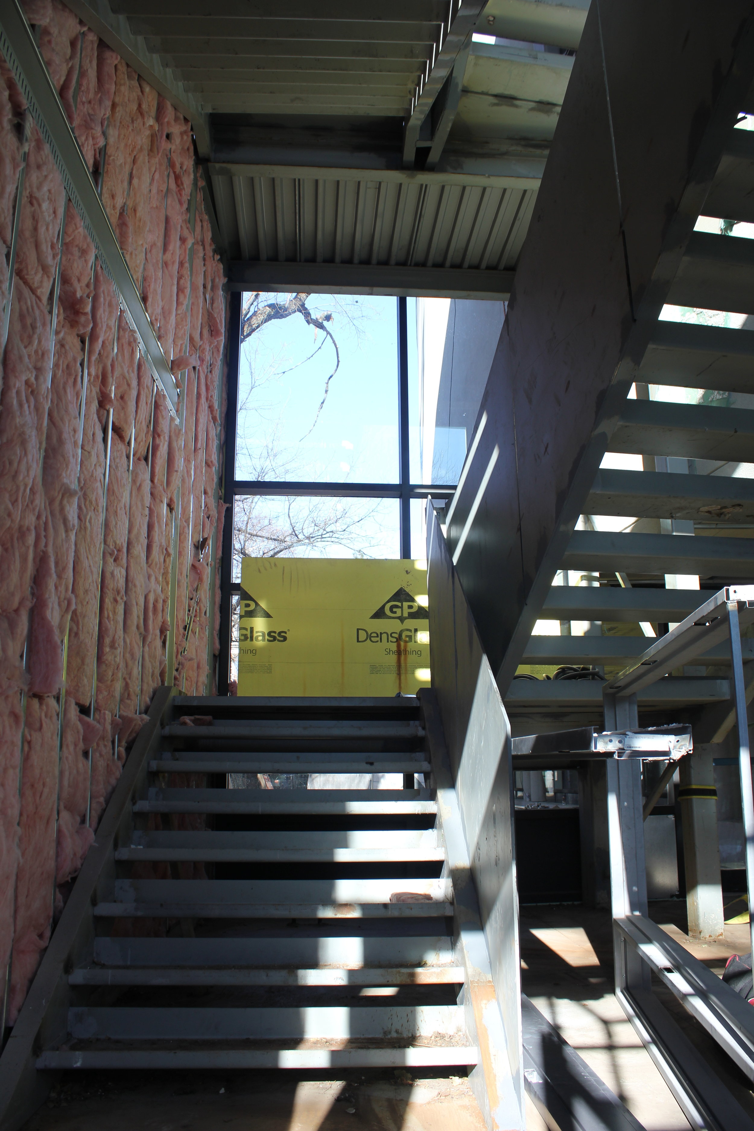 Travelling up the Athletic Centre stairs, linking the ground floor Gladiator Athletic Centre with the gym and indoor track.