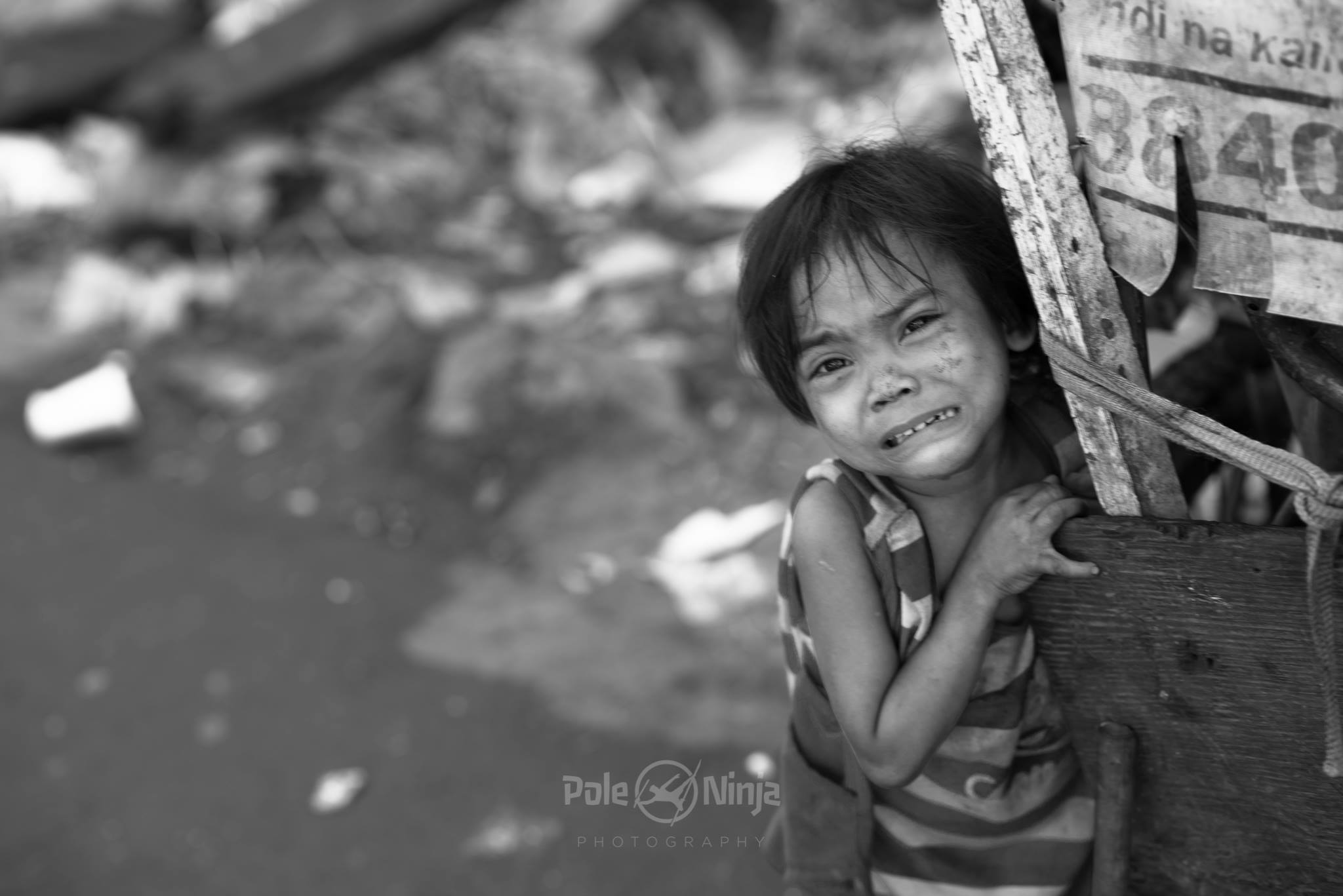 Sorry for the blur, but yes, as children are, they can cry. Though this looks like a poster for feed-the-children, I don't think this is why she was crying at the moment.