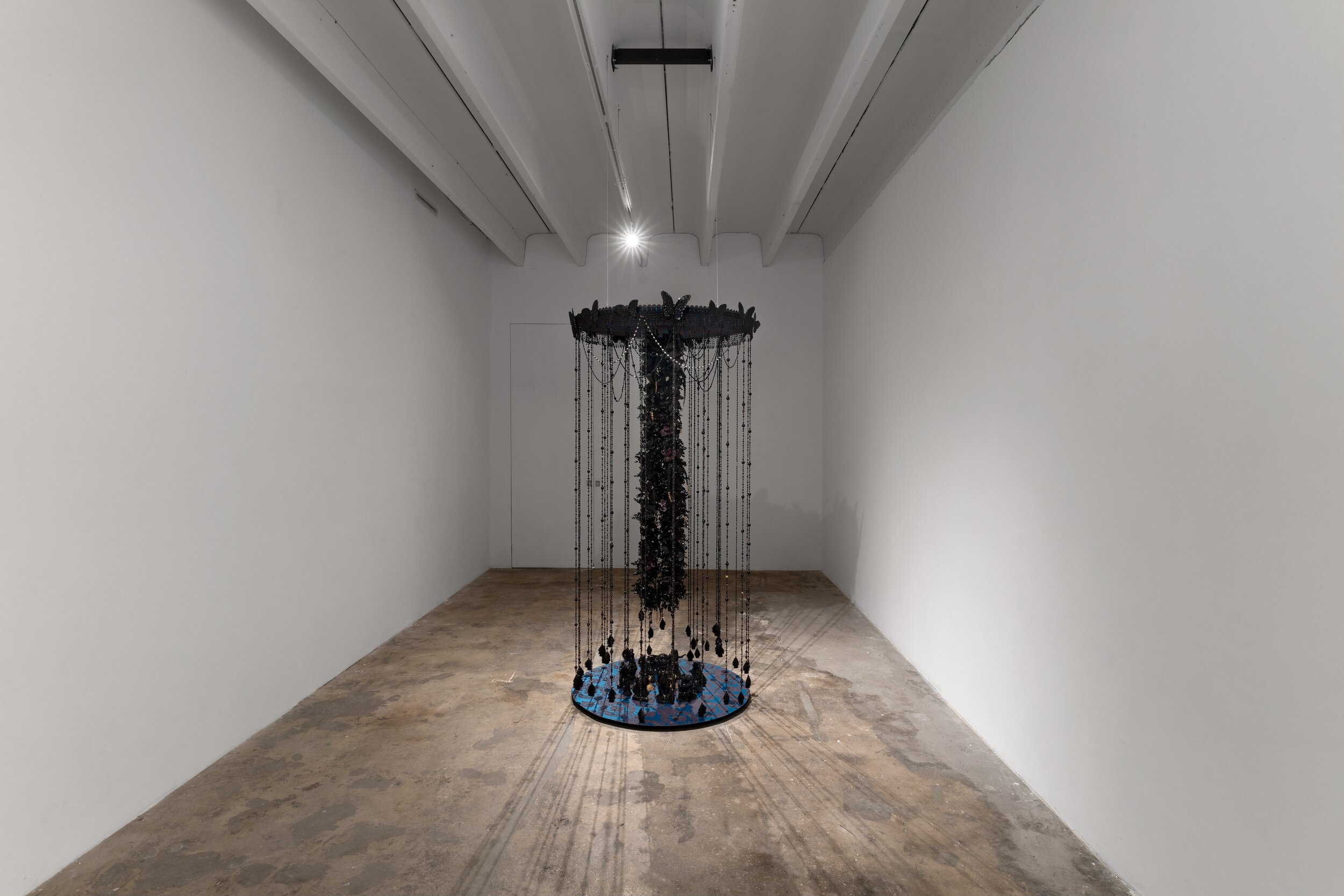   Vickie Pierre   Black Flowers Blossom (Hanging Tree)  , 2020 Hand-strung glass, plastic, and wood beads; fabric, plastic butterflies, flowers, and foliage; Glitter, vintage Avon perfume bottles, and wooden ship bookends 96 x 45 inches  (1/3) 