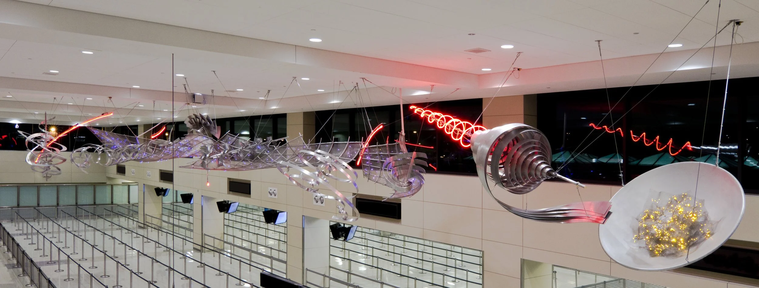   Alice Aycock   The Game of Flyers Part Two , 2012 Aluminum, fiber optics, LED lights, neon approximately 75 feet long and 13 feet wide  International Arrivals Building at Washington Dulles International Airport, Washington, D.C.     
