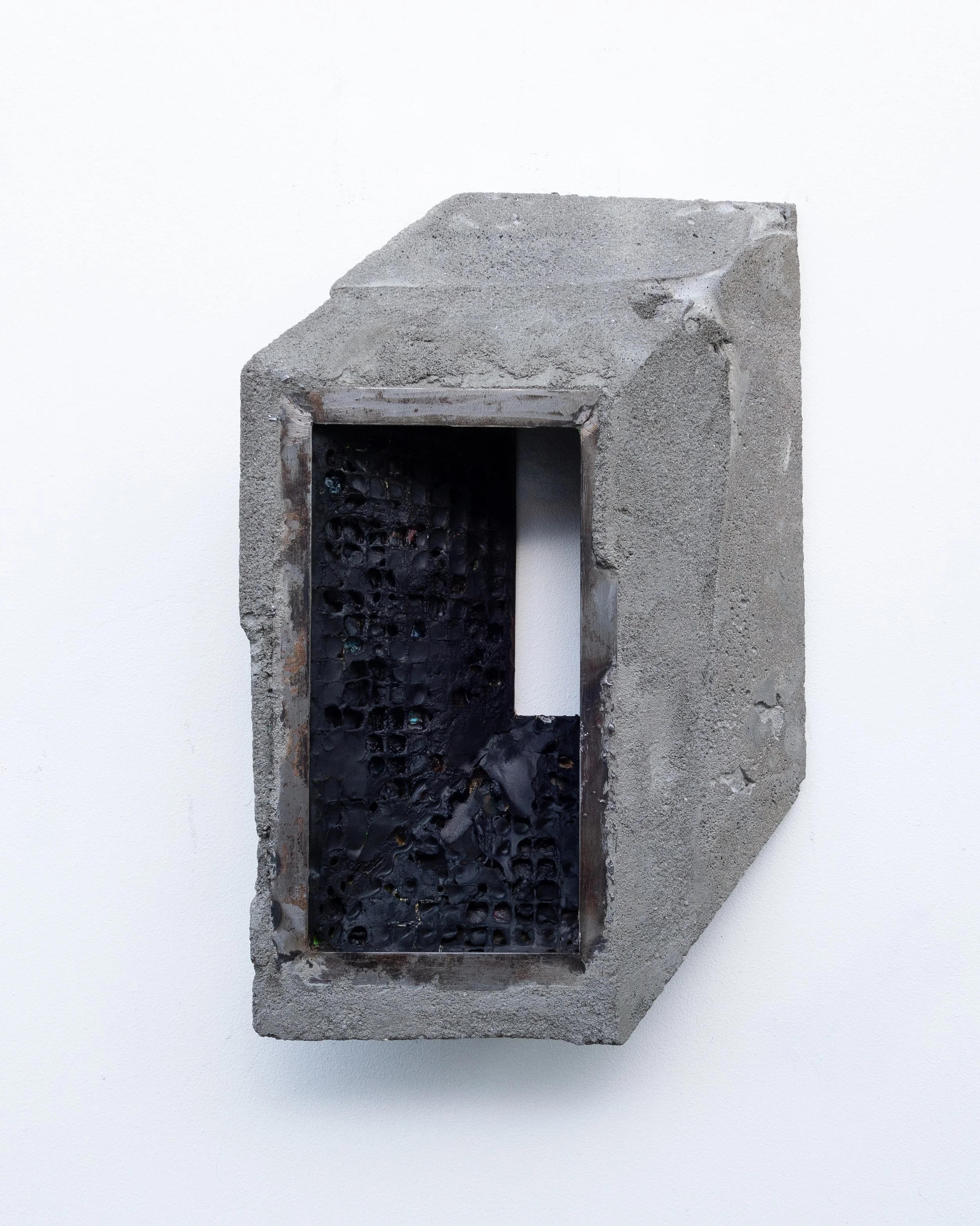   Troy Simmons   SOCIAL CONTRACT,  2020 Reinforced concrete, Steel, Torched acrylic, and  Found material 17” x 24”x 4” 