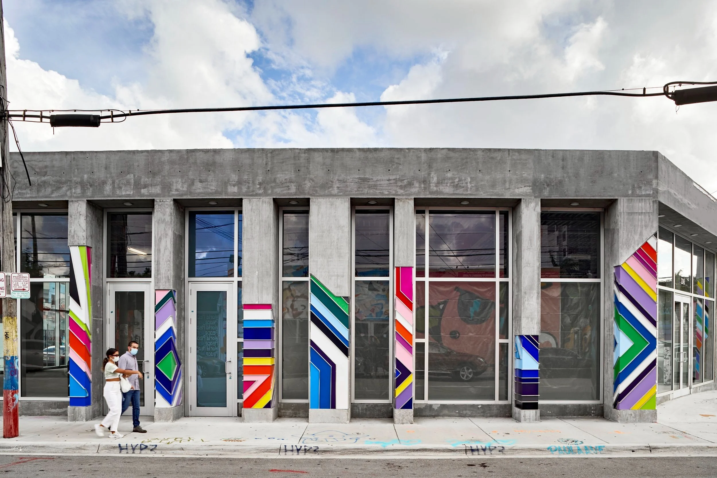   Troy Simmons    Wynwood 2300 Building,   2020 Board Formed structural concrete facade, 21 Aluminum inlays, Auto paint  Dimensions Variable:  11’6” to 4’ feet    2235-2245 NW 2ND Avenue Miami, FL 