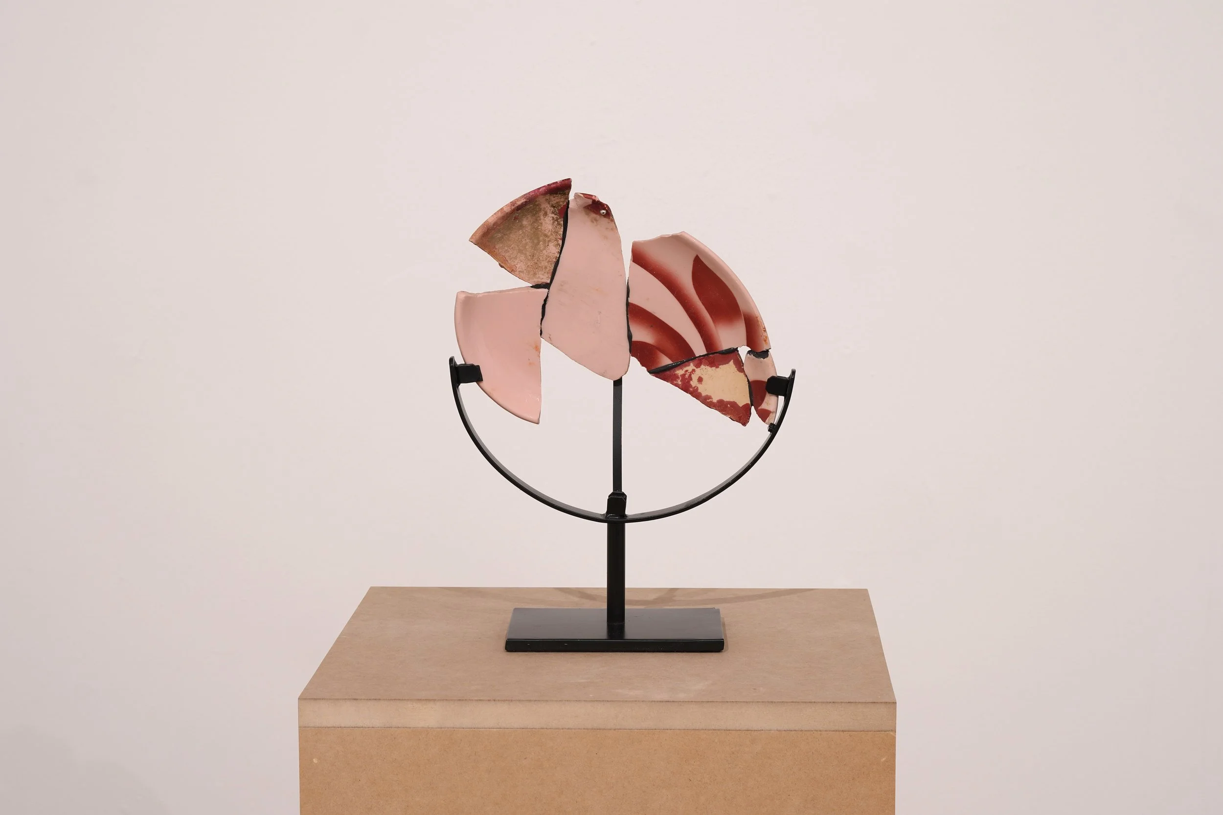   María Elena González   Tepco Plate/Pink , 2024 Glazed ceramic, epoxy, painted brass and steel 13 x 9 1/2 x 4 3/8 in 
