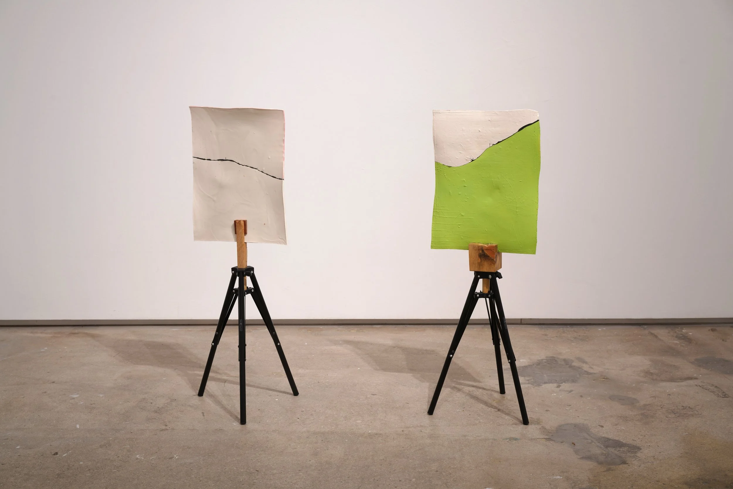   María Elena González   Pair , 2024 Glazed ceramic, epoxy, wood, metal tripods, enamel paint Green- 39 x 14 x 12 in Pink- 40 x 13 1/2 x 12 in 