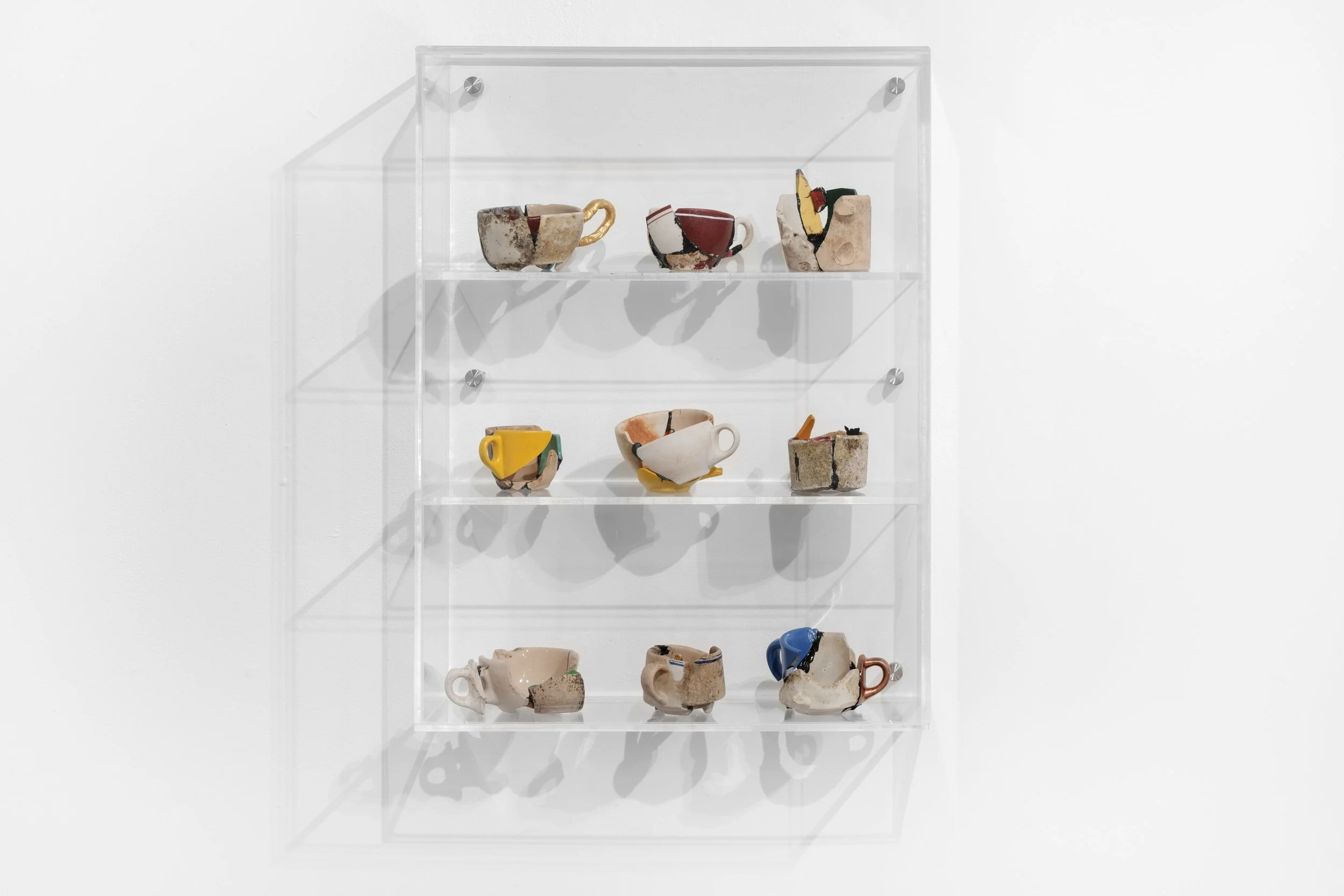   María Elena González   Vitrine III , 2024 Glazed ceramic, epoxy, gold leaf and plexiglas 27 3/4 x 20 7/8 x 7 1/2 in 