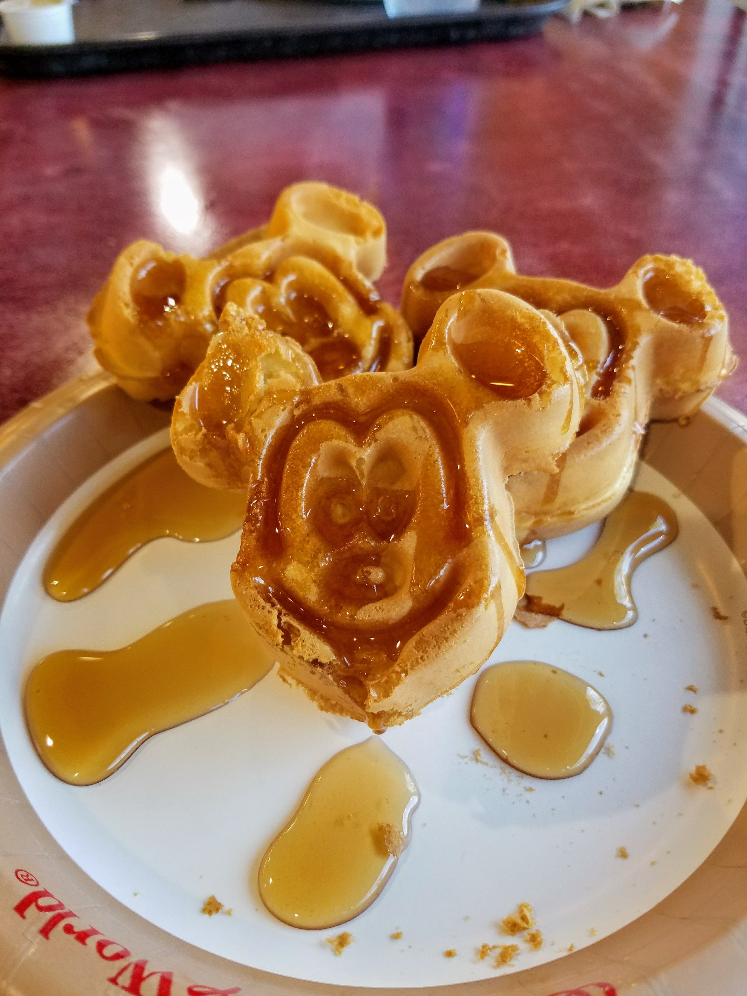Mickey waffles are served at just about every sit-down breakfast place. Disneyland - Carnation Cafe. Disney World - The Plaza Ice Cream Parlor and Crystal Palace