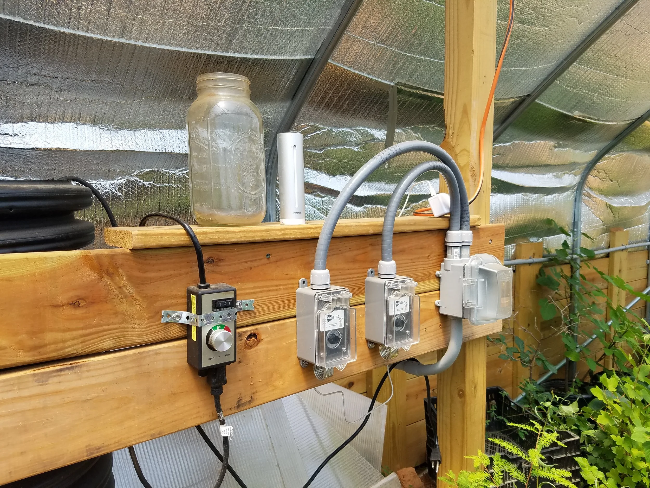 Controls for the geothermal heating system inside the greenhouse.