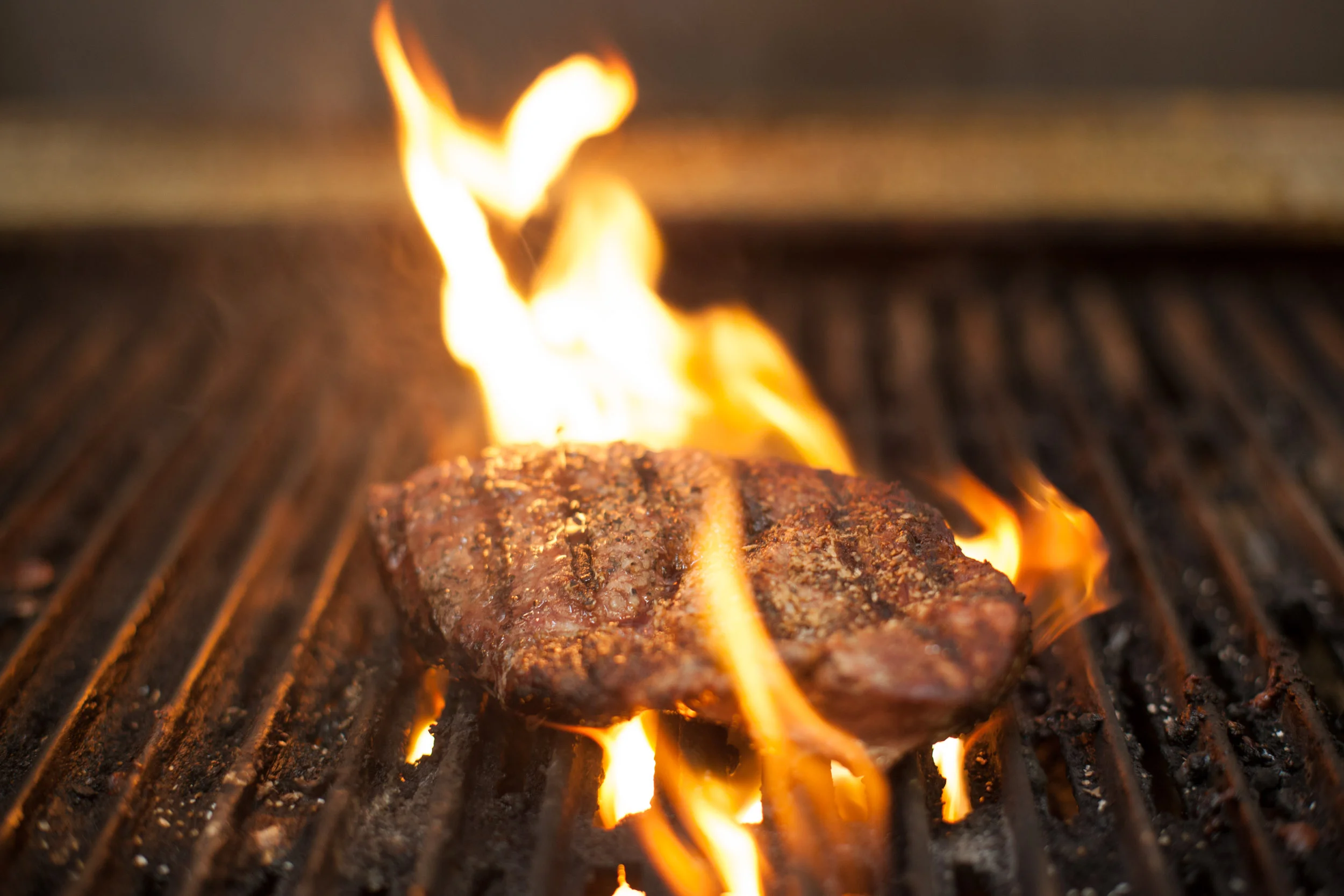 Flame grilled salted New York Strip steak 