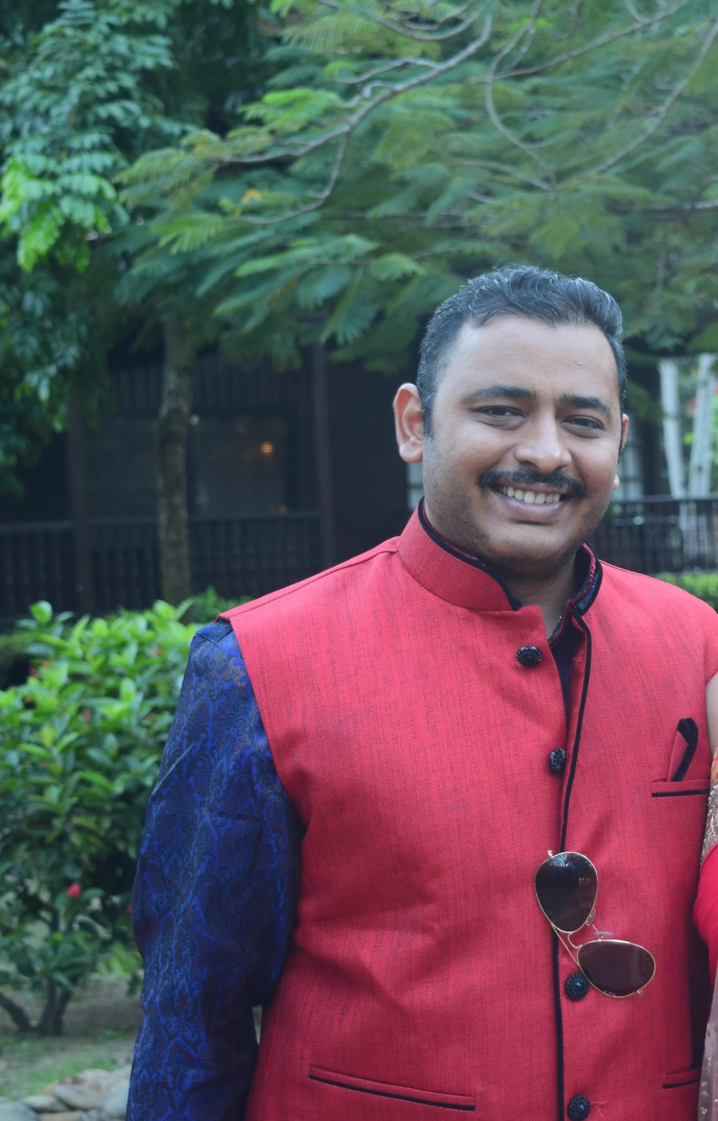 Red neta jacket with a silk kurta 