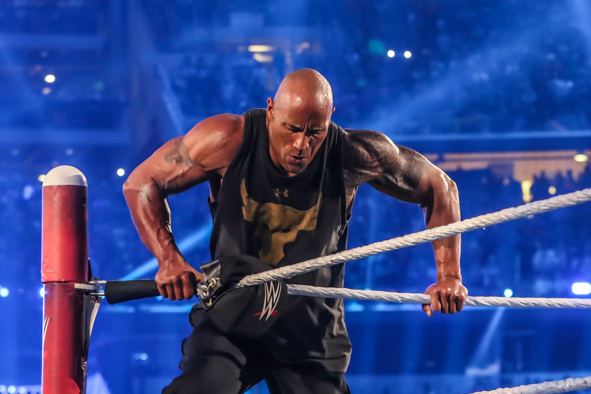   Dwayne "The Rock" Johnson  climbs into the ring at  WrestleMania 32  at AT&amp;T Stadium in Arlington, Texas on April 3, 2016. 