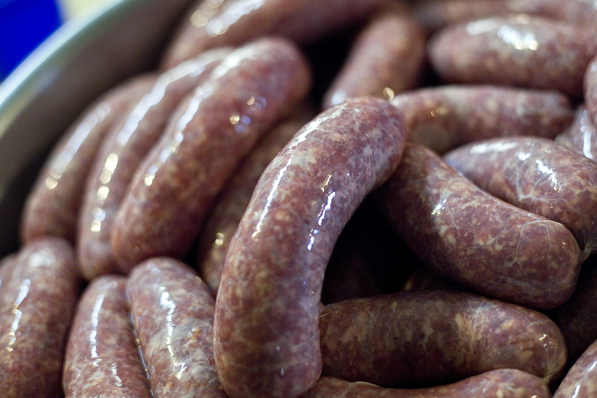 During the annual hog butchering weekend, family members make ground pork sausage, liver sausage, blood sausage, head cheese, pickled pigs feet and lard and carve the meat into select cuts.