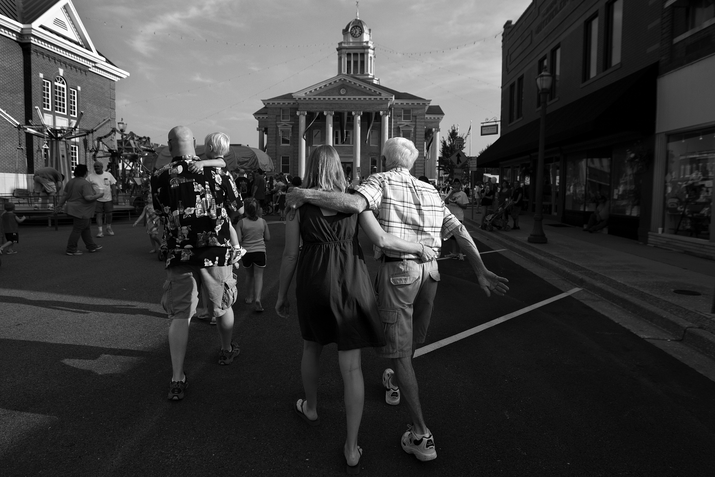 Walking became a problem for Red because of his Parkinson’s disease. He often used a walker, motorized scooter or wheelchair to get around on days when he struggled to walk. One way the family found to aid him with walking was to grab him around his