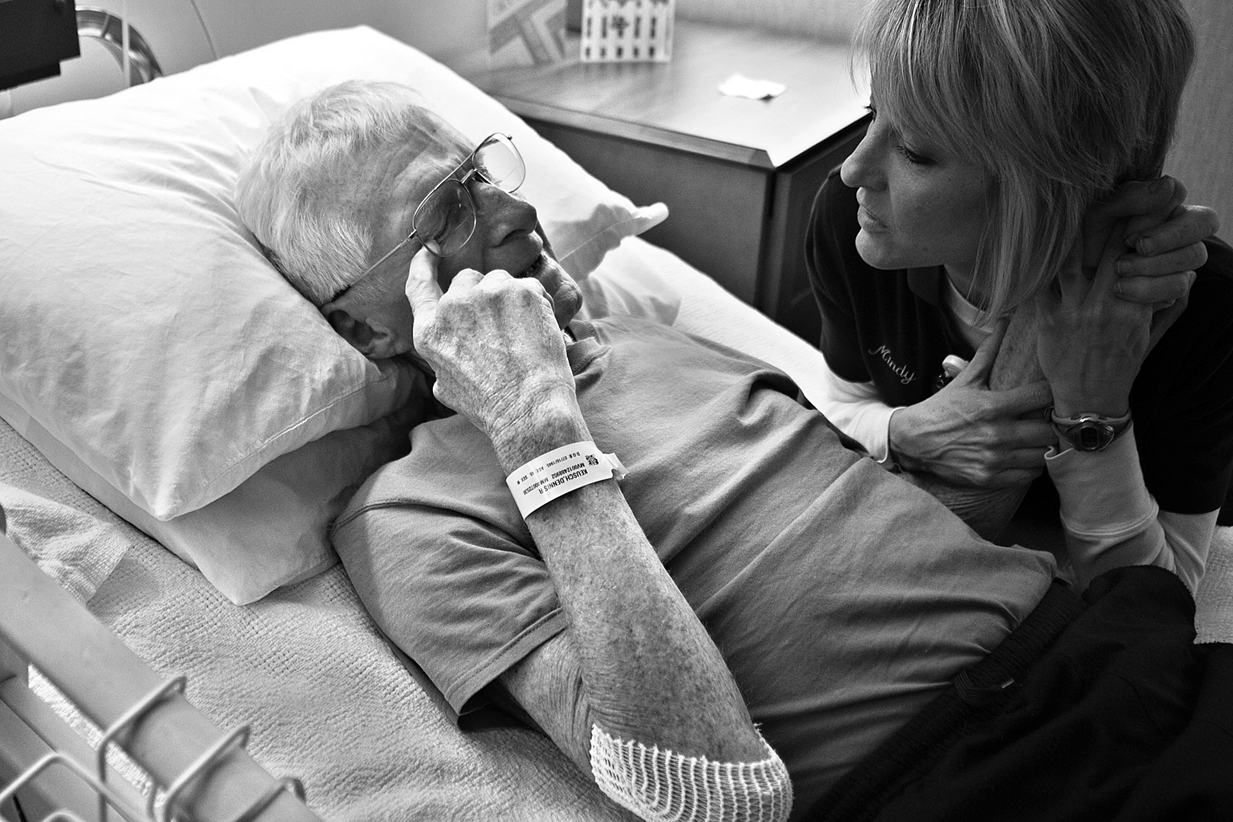 Physical therapy assistant Mindy Bueltel of Jasper tried to comfort Red and tell him there was no need to apologize for his struggles while she worked with him in his room at Memorial Hospital and Health Care Center in Jasper. Red became emotional a