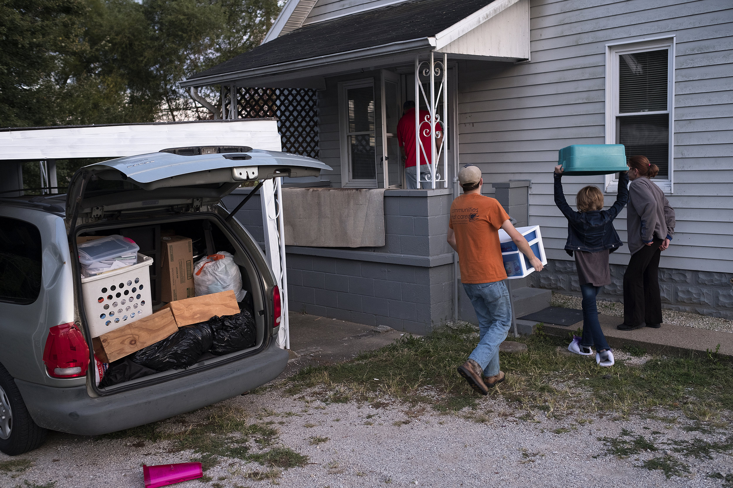  After living in a hotel and a motel for over a year and a half, the Knoxes finally found a rental home to move into. The Knoxes unloaded a van-full of their stuff as they moved into the home. 