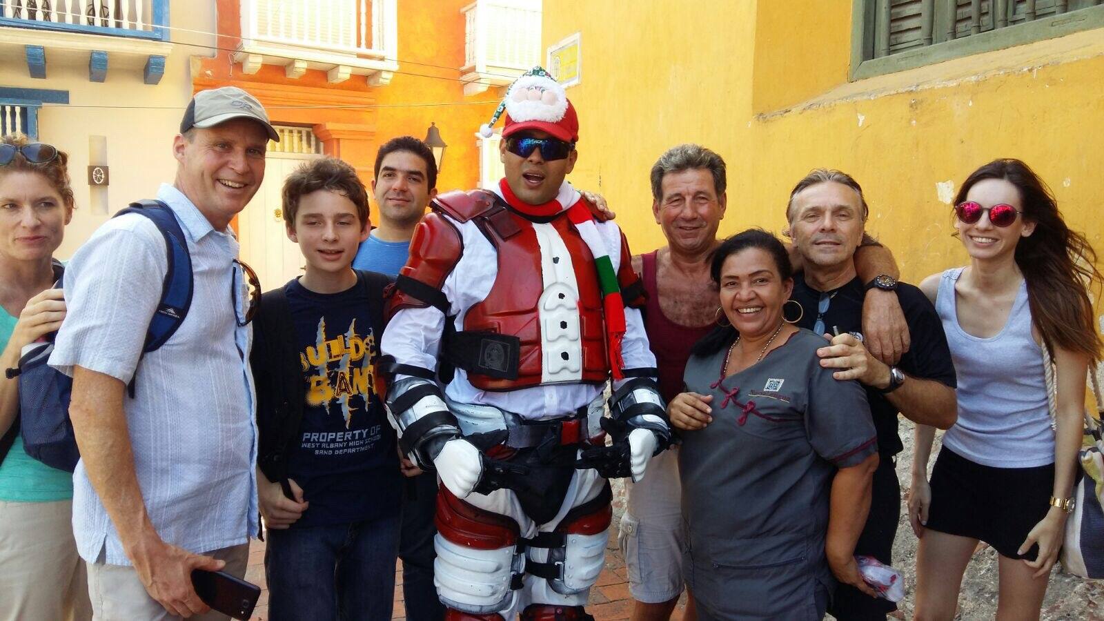 Friends from Nueva Lengua participating with Cartagena police in a Christmas charity event for local children.