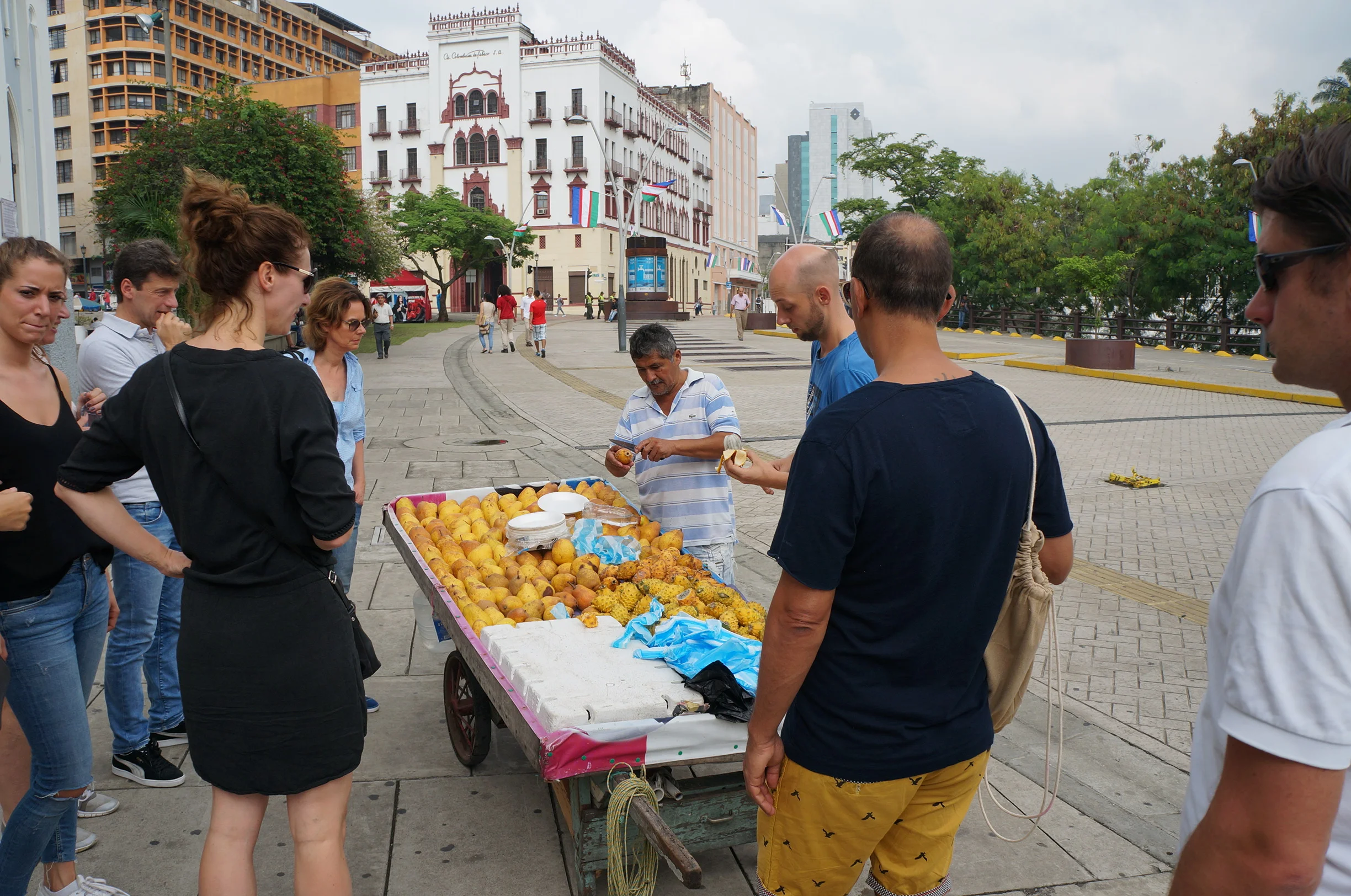 Giving pitahaya, an exotic fruit often found in Colombia, a try.