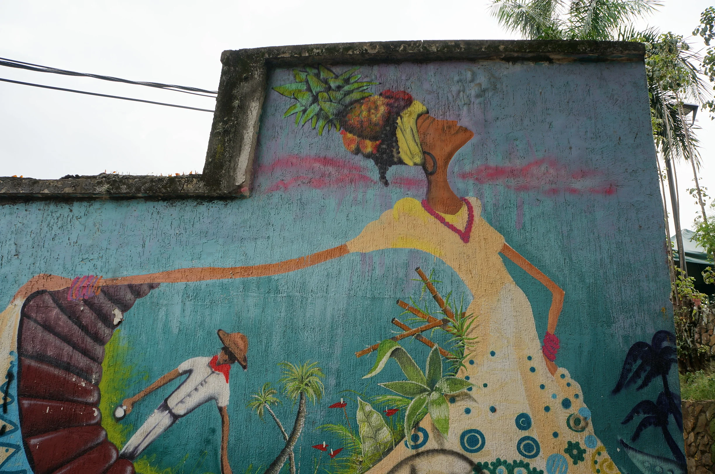 A vibrant mural, typical of Cali, seen on a city walking tour (tour details below).