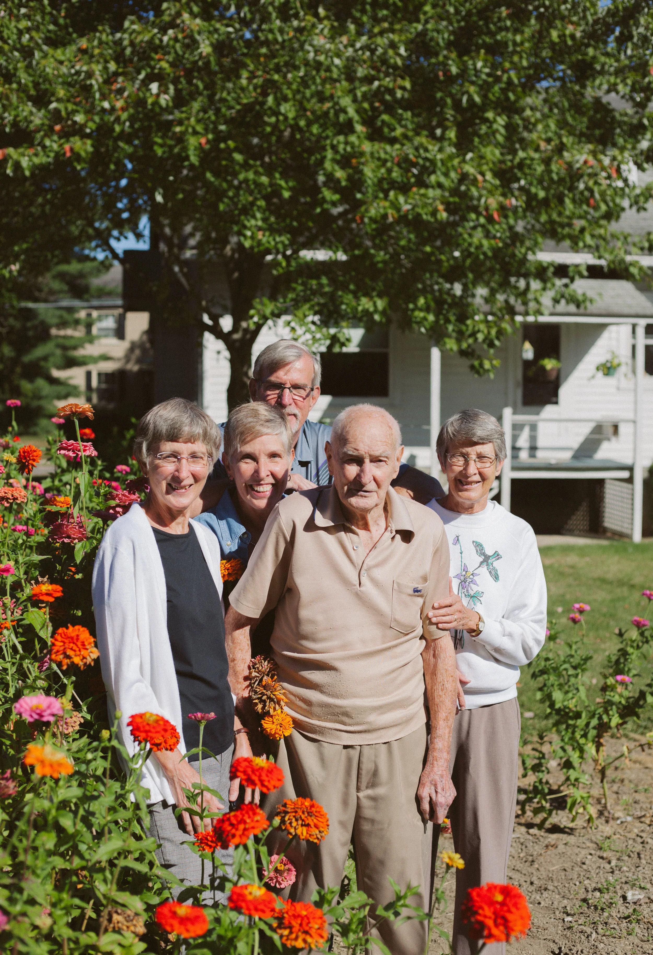  This home is warm because of Grandpa, two Aunts and Uncle and my Mother in law who help Grandpa daily. They tend to his garden as he jokes with them that they aren’t doing it right because he can't do it himself. Not the way he’s done it for so many years. That is the hard part of being 103. He watches through his big window at the beautiful flowers and is grateful to them for all they do to upkeep the beauty. 