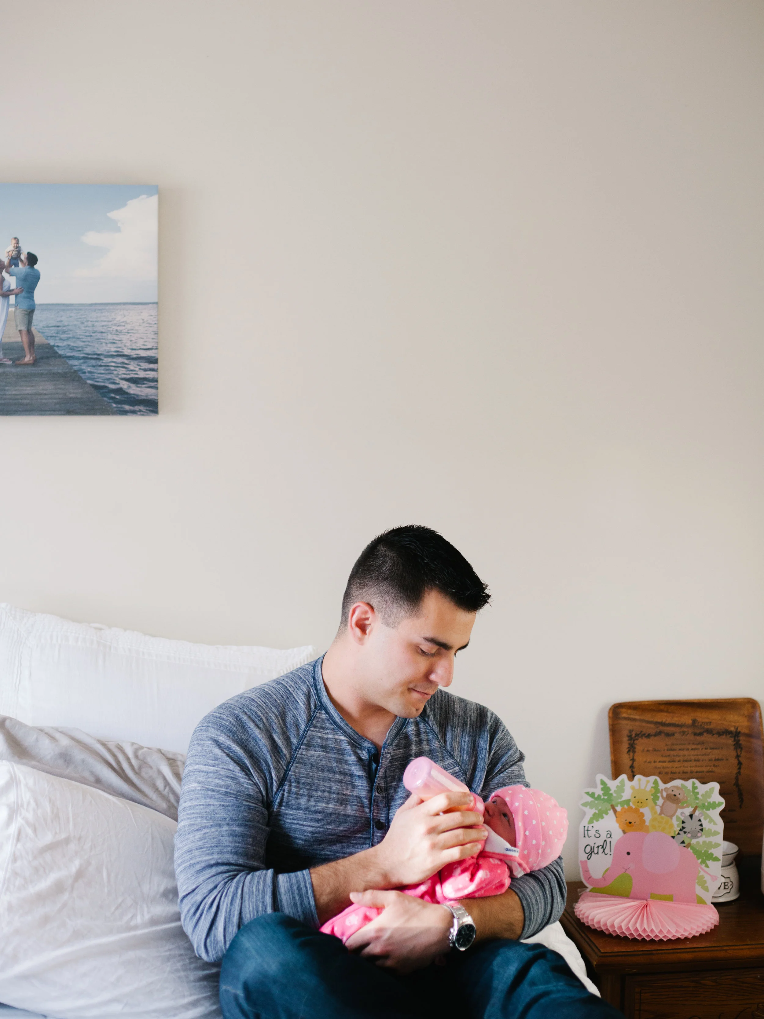  This session was very special to me. These two parents aren't just clients but some of my closest friends. The kind of friends who have moved over to the category of family. The kind that you pass a dish back and forth between houses with...filled with food for each other on a weekly basis. The kind of friends you drop your kids off with when you go to the grocery store. This family has been through a lot to build their family to where it is now. One healthy two year old boy and this perfect little newborn girl. It gives me great joy to share these images with you as I with her parents introduce Miss Evelyn Marie to the world.