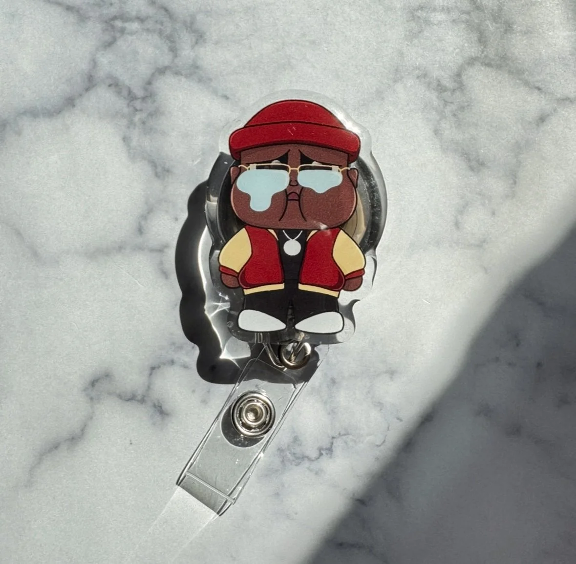 e40 x crybaby badge reel