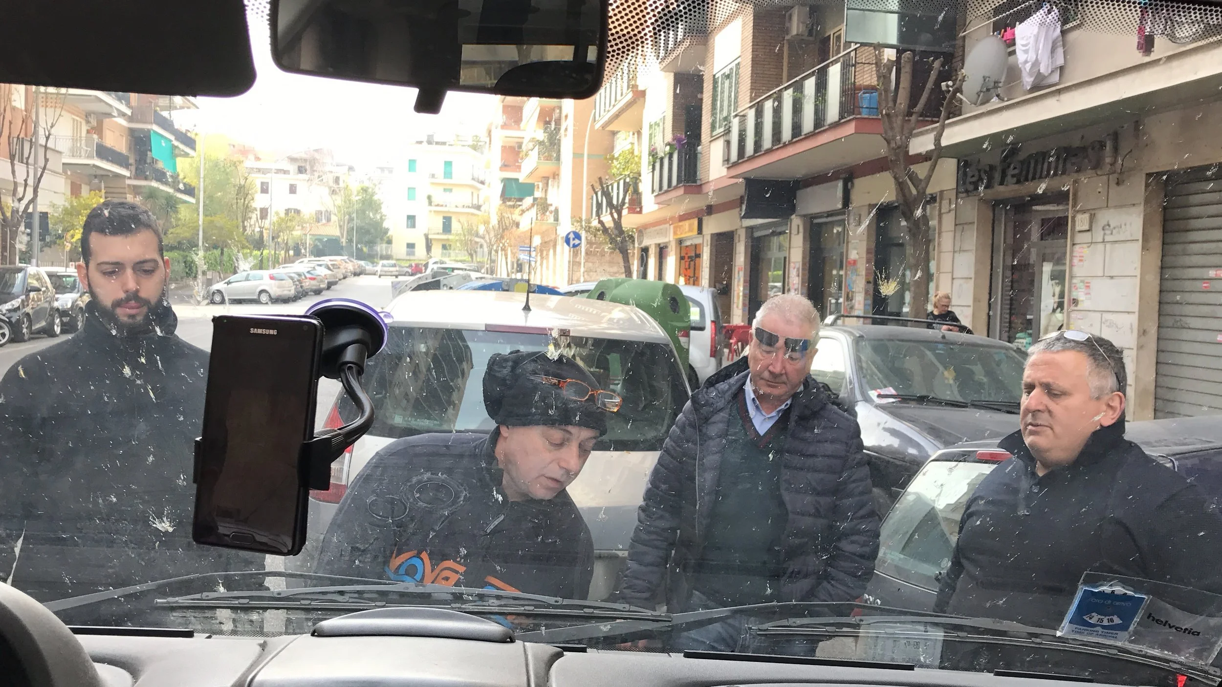 Four mechanics are better than one. Helping us make sure that too much oil won't hinder our progress to Turin
