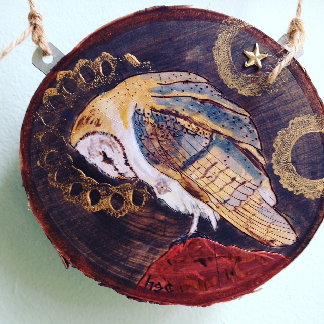pyrography on birch, acrylic paint, twine, glass beads, stud, hardware. 2016.
