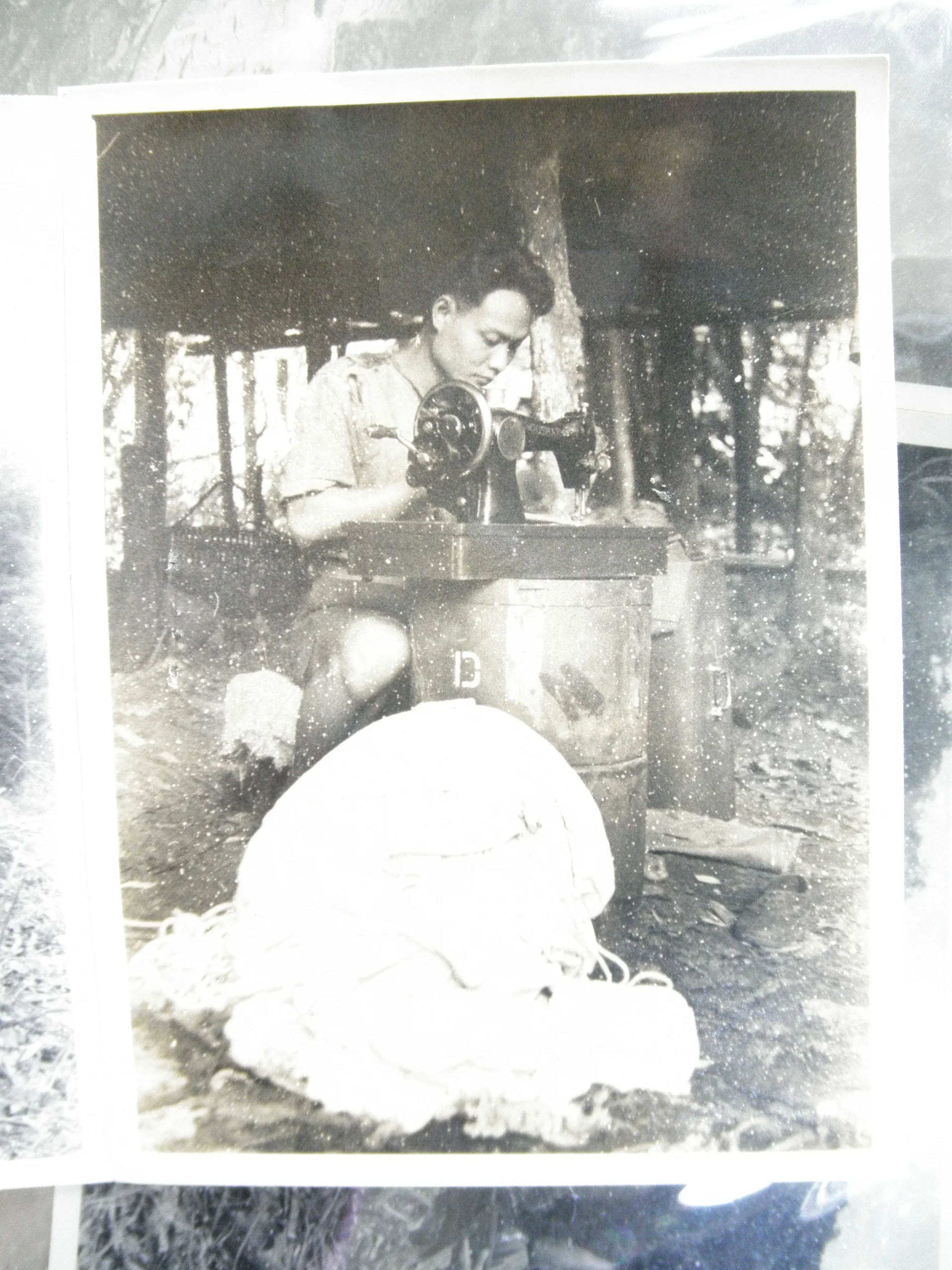 Parachutes being made into shirts in an OCAJA camp