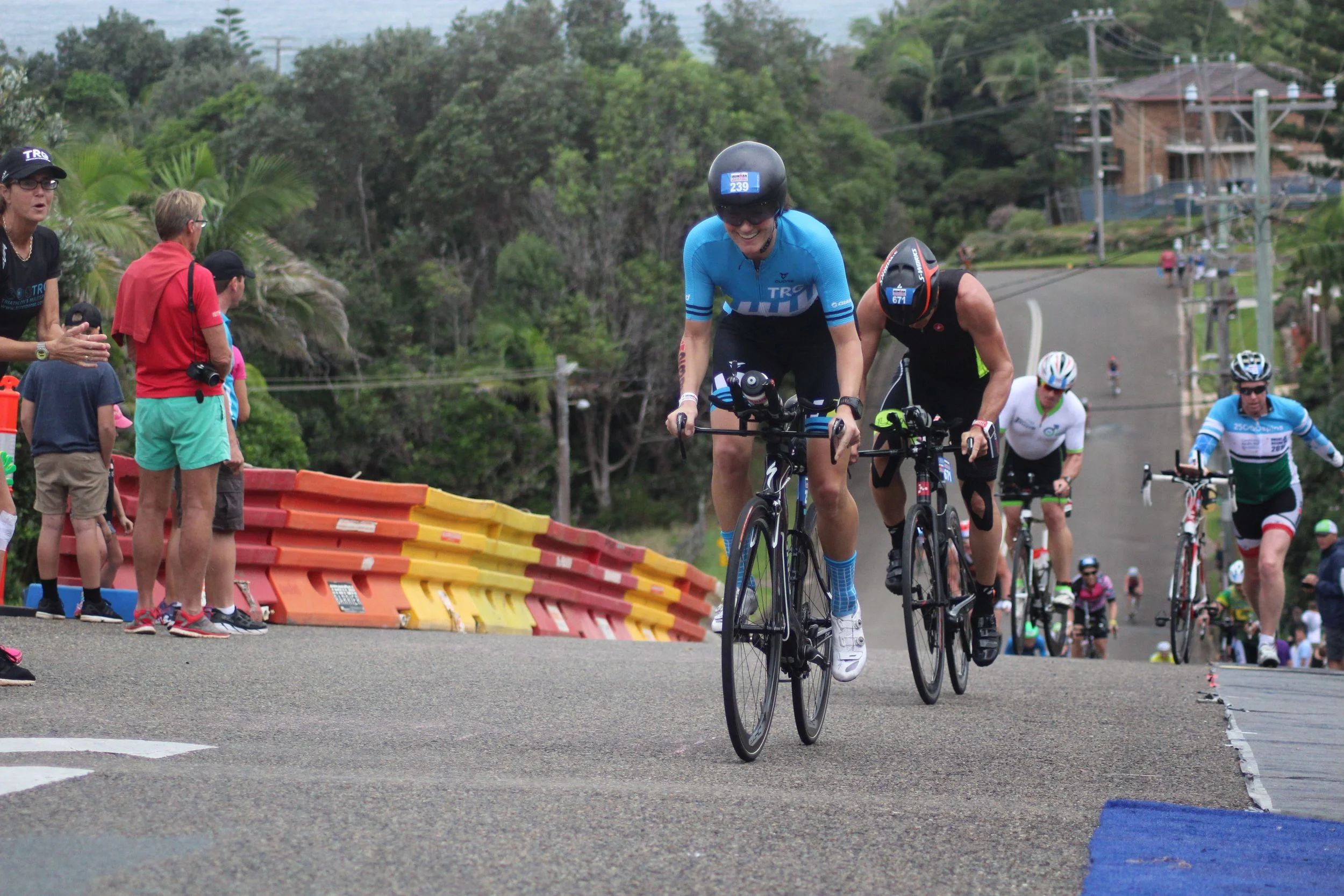 TRG - Sarah chicking men behind her - hill.jpg