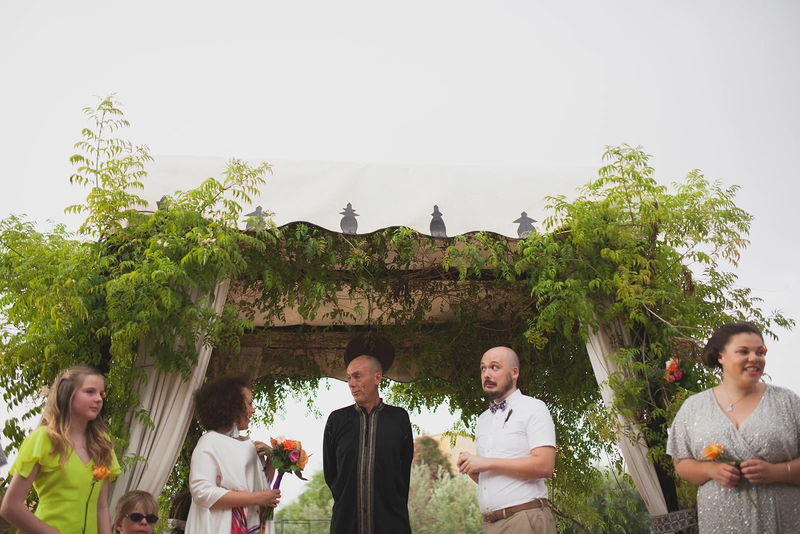 a groom looks nervous during the wedding ceremony. fawakay villas marrakech wedding morrocco wedding photography. stop motion wedding films uk