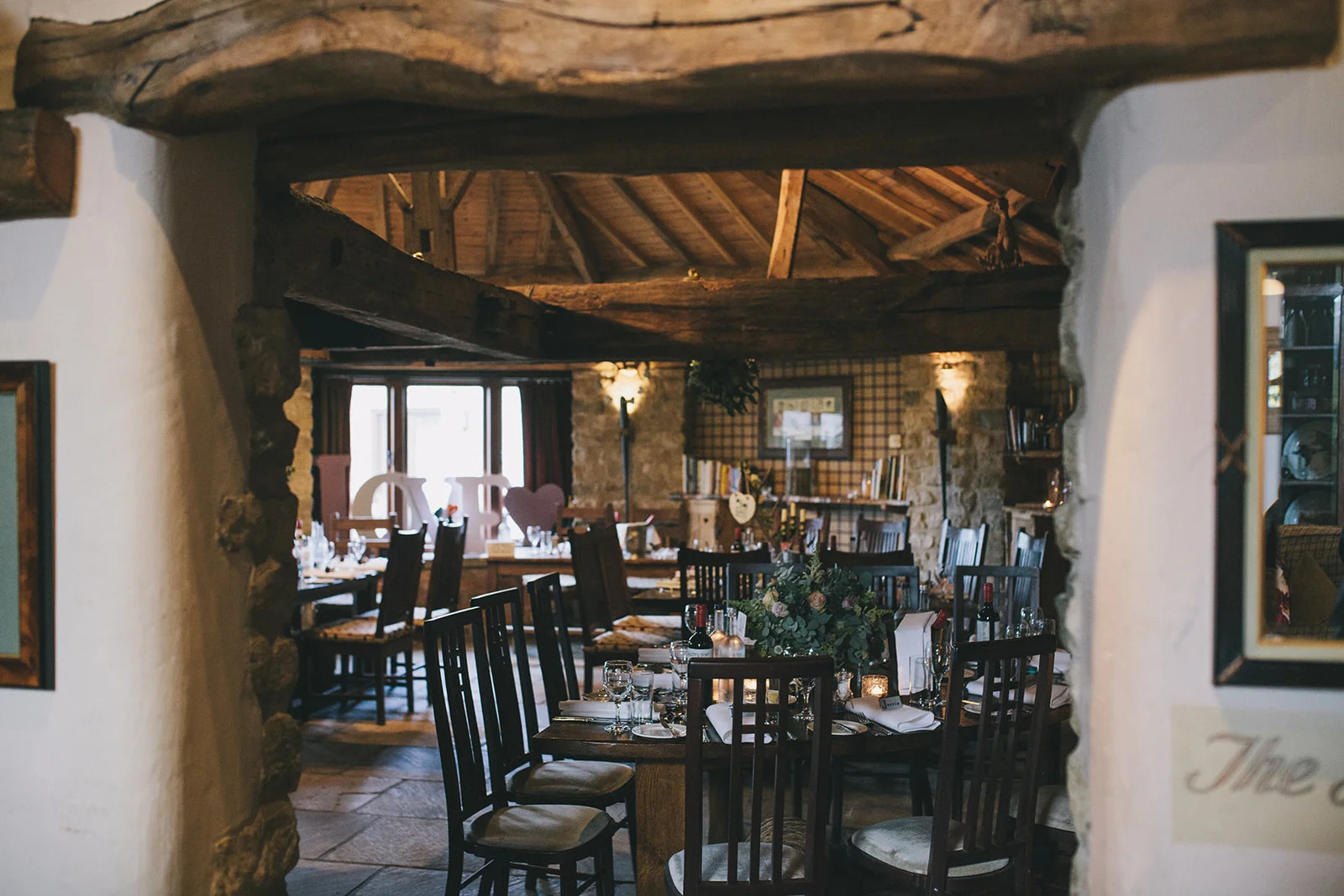 a shot of the room set up for the wedding, rustic and autumnal. star inn at harome near helmsley, north yorkshire wedding photographer. stop motion wedding films uk.