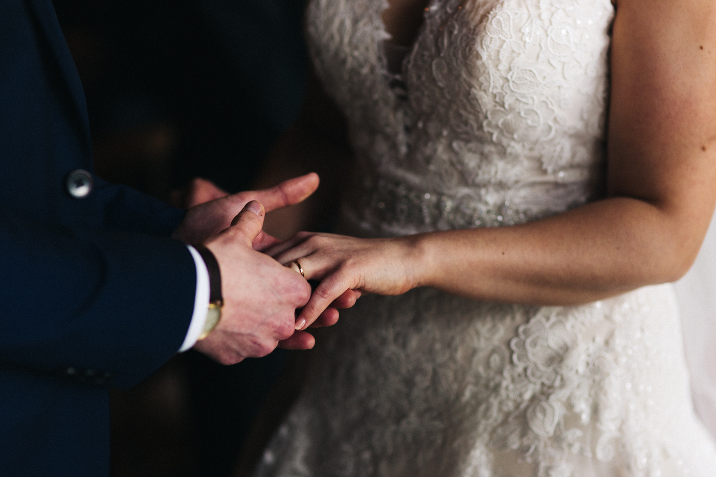 a close up of the ring exchange. spring barn wedding at east riddlesden hall keighley west yorkshire wedding photographer