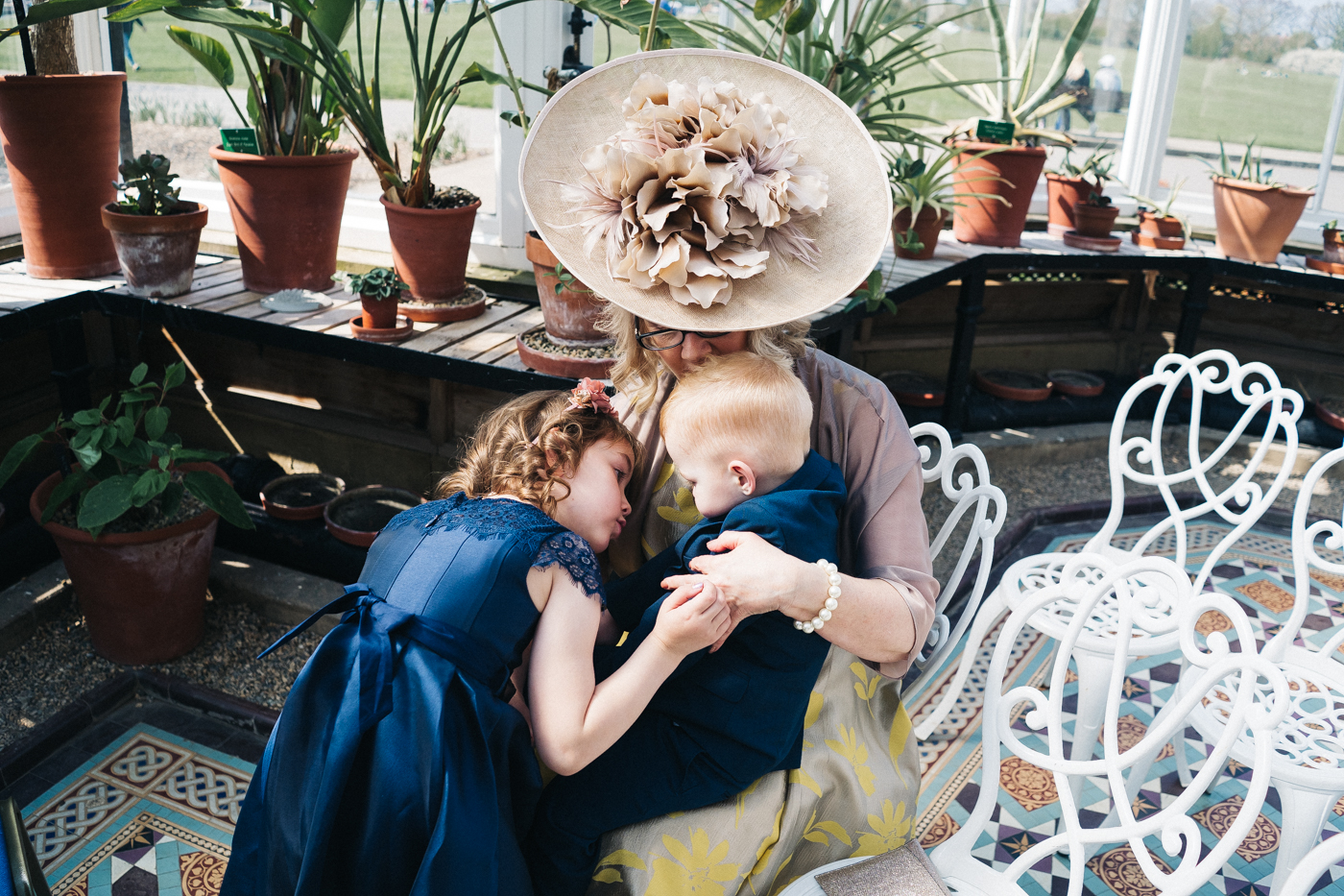 a grandma cuddles her granddaughter and grandson. preston park museum wedding stockton teesside middlesbrough wedding photographer
