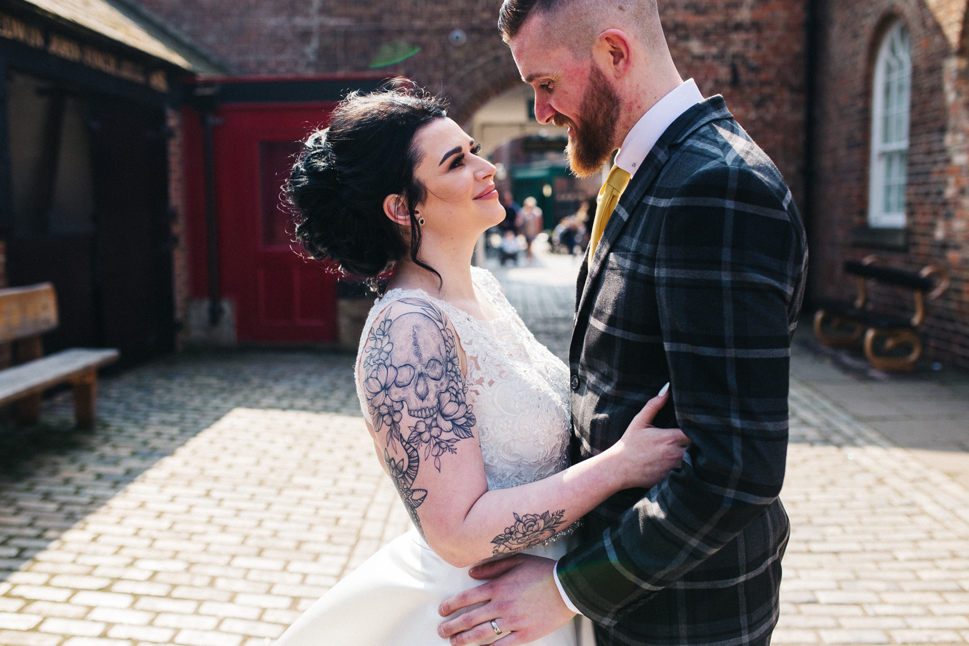 the bride and groom embrace and look at each other. preston park museum wedding stockton teesside middlesbrough wedding photographer